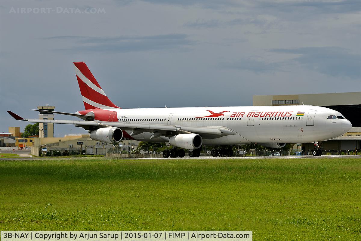 3B-NAY, 1996 Airbus A340-313 C/N 152, 'Cardinal' taxiing out for departure from rwy 14 in the morning.