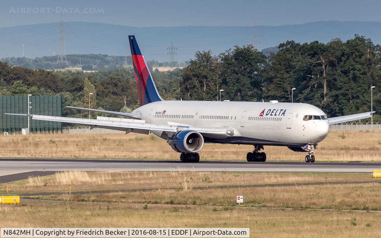 N842MH, 2001 Boeing 767-432/ER C/N 29715, decelerating after touchdown on runway 07L