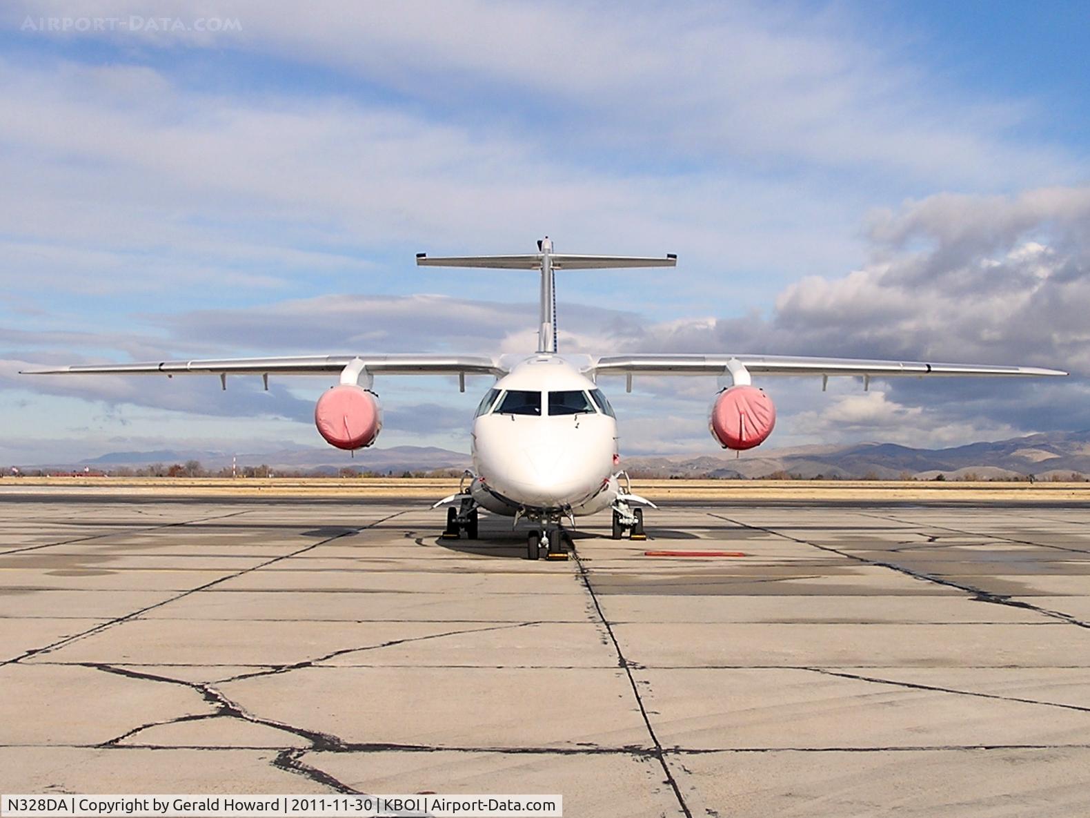 N328DA, 2001 Fairchild Dornier 328-300 328JET C/N 3171, Parked on western ramp.