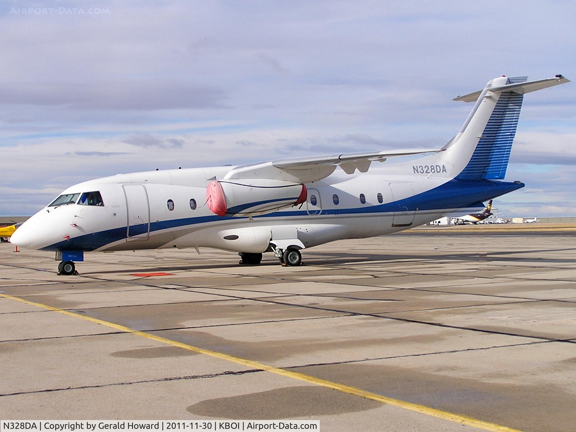 N328DA, 2001 Fairchild Dornier 328-300 328JET C/N 3171, Parked on western ramp.