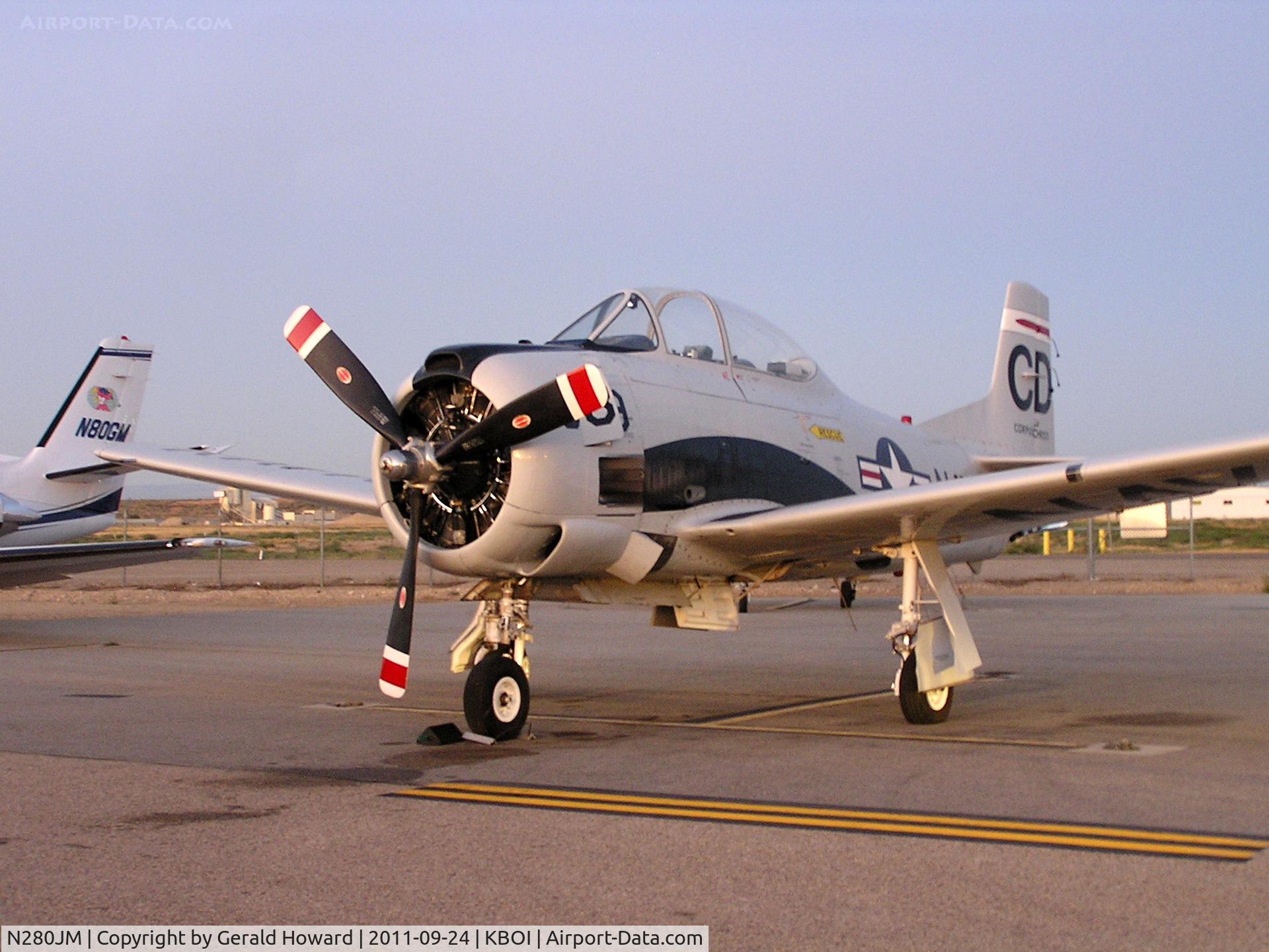 N280JM, North American T-28C Trojan Trojan C/N 226-166, parked awaiting maintenance.
