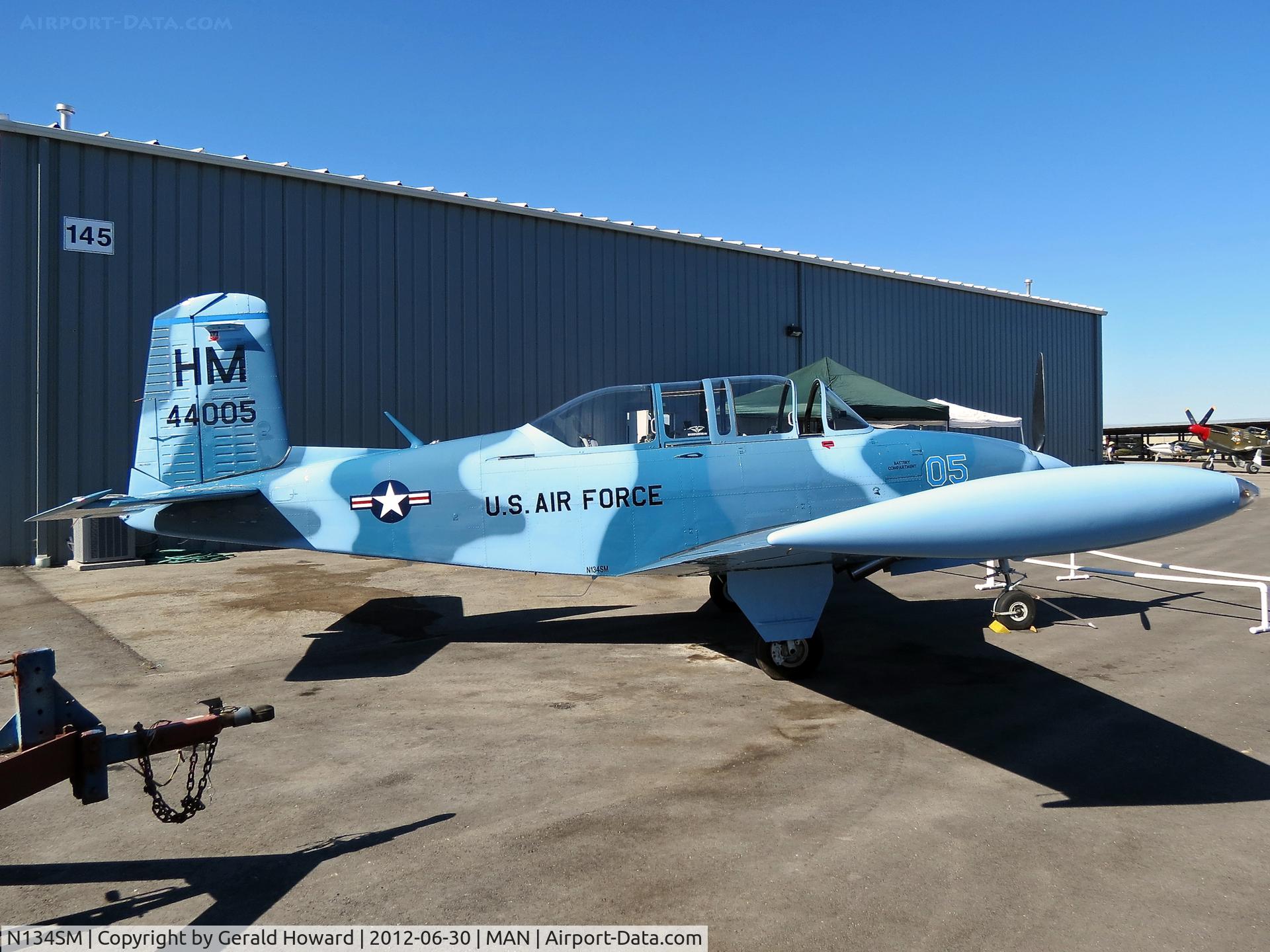 N134SM, 1957 Beech T-34B Mentor C/N BG-312, Sitting in a corner at the Nampa Airshow.