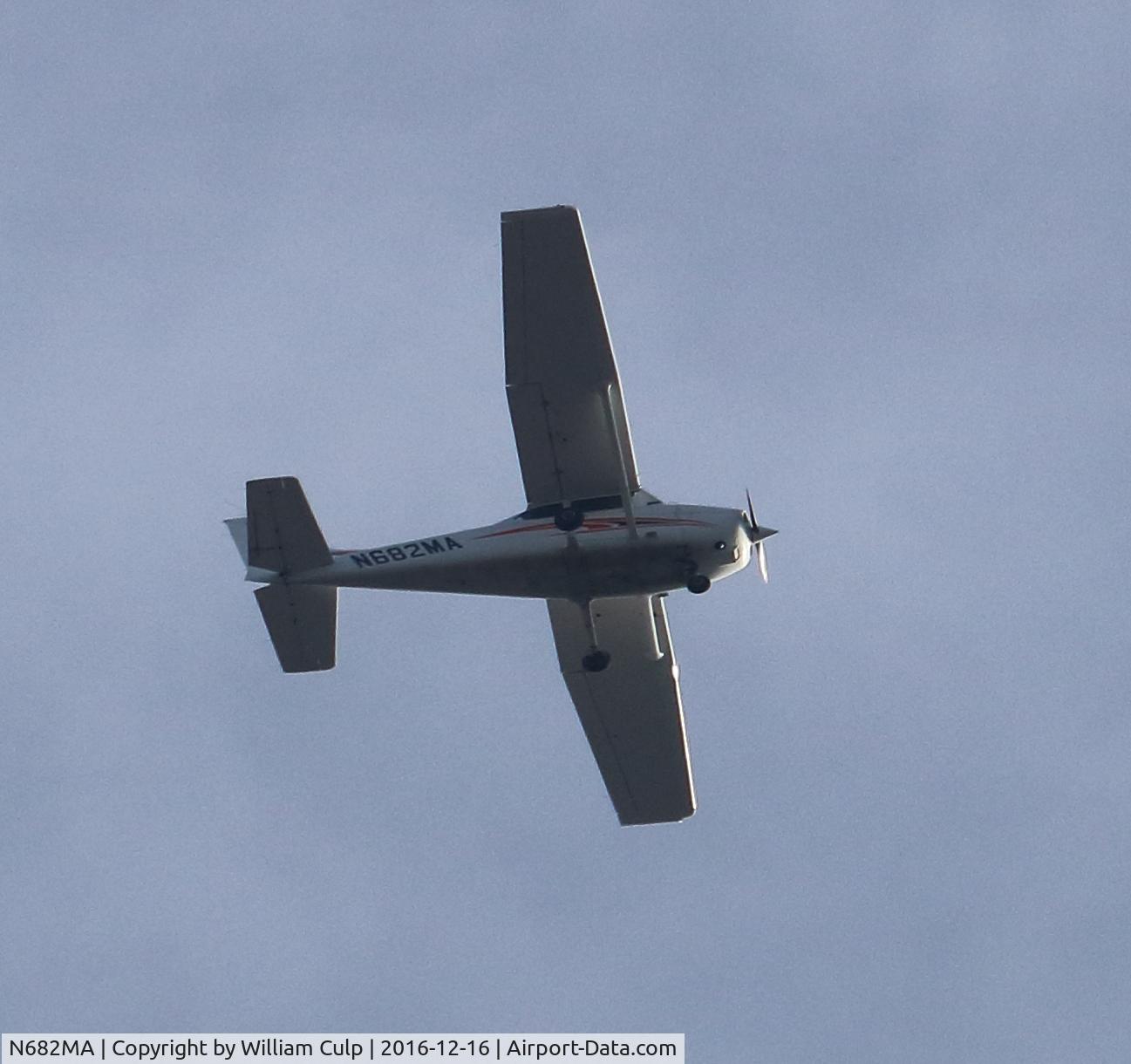 N682MA, 1999 Cessna 172S C/N 172S8204, It was flying over Peace Valley Park, Bucks County Pa. 12-16-16. I photograph planes as they fly over. I share my pictures of aircraft with my friend Tim. We both are interested in aviation.