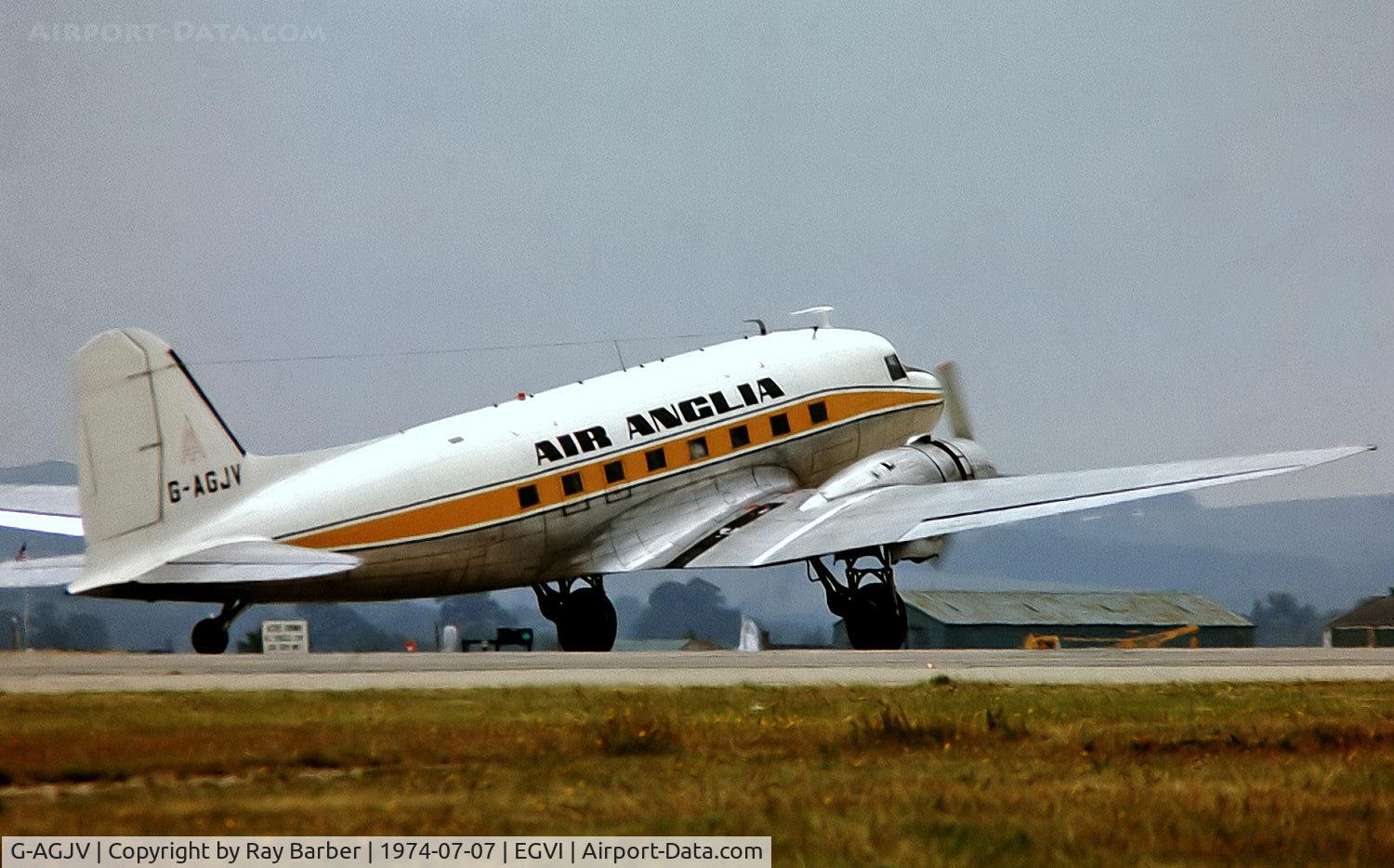 G-AGJV, 1943 Douglas C-47 Dakota 4 C/N 12195, Douglas DC-3C-47A-1-DK [12195] (Air Anglia) RAF Greenham Common~G  07/07/1974. From a slide.