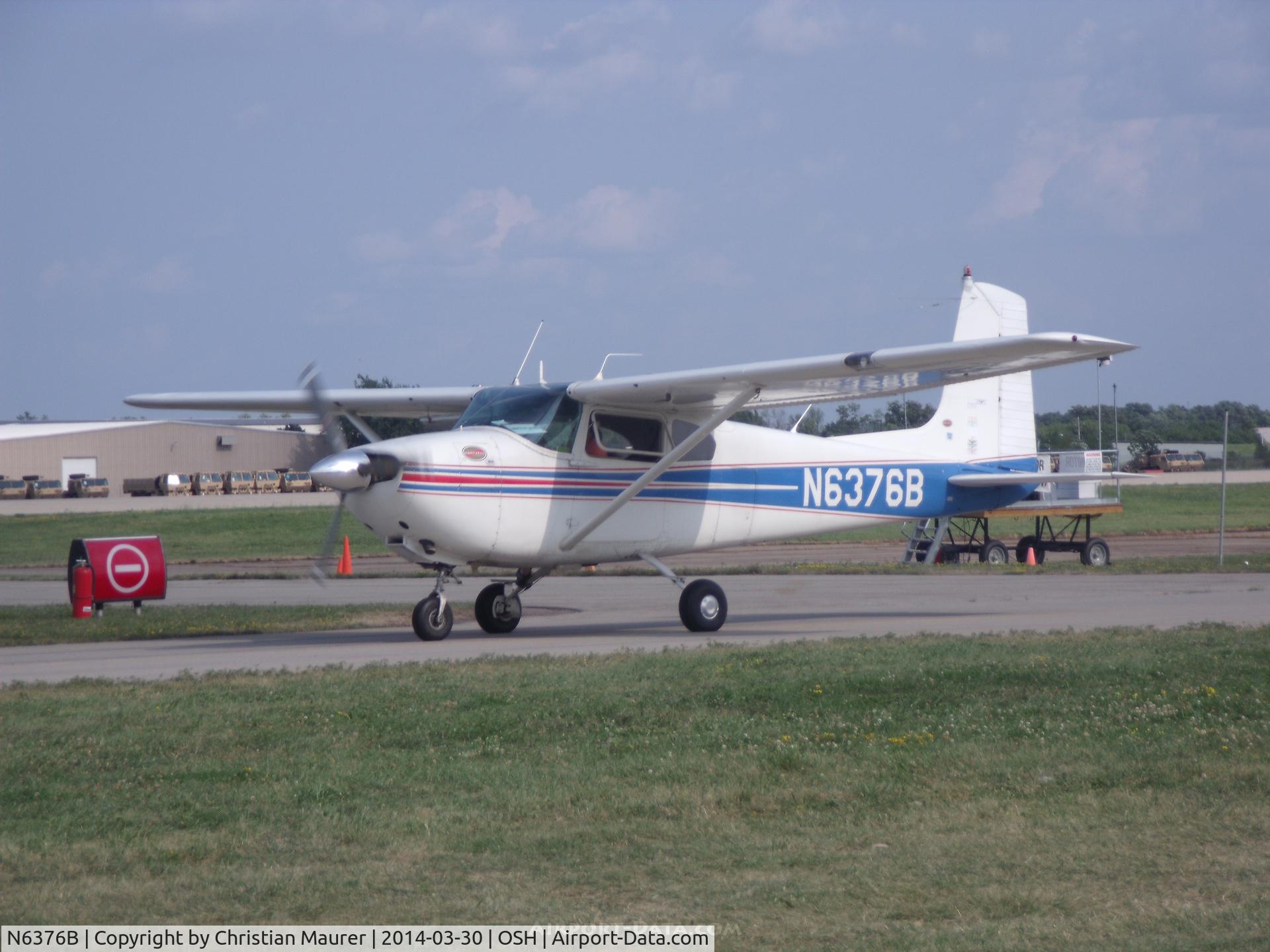 N6376B, 1957 Cessna 182A Skylane C/N 34276, Cessna 182A getting out quick before Airshow