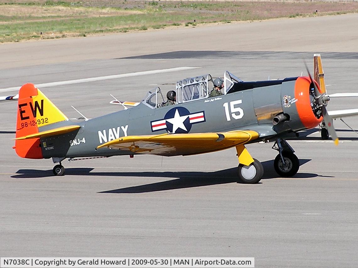 N7038C, 1957 North American SNJ-4 Texan C/N 88-12932, taxing on GA ramp.