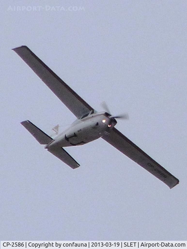 CP-2586, 1979 Cessna T210N Turbo Centurion C/N 21063171, leaving SLET with low light
