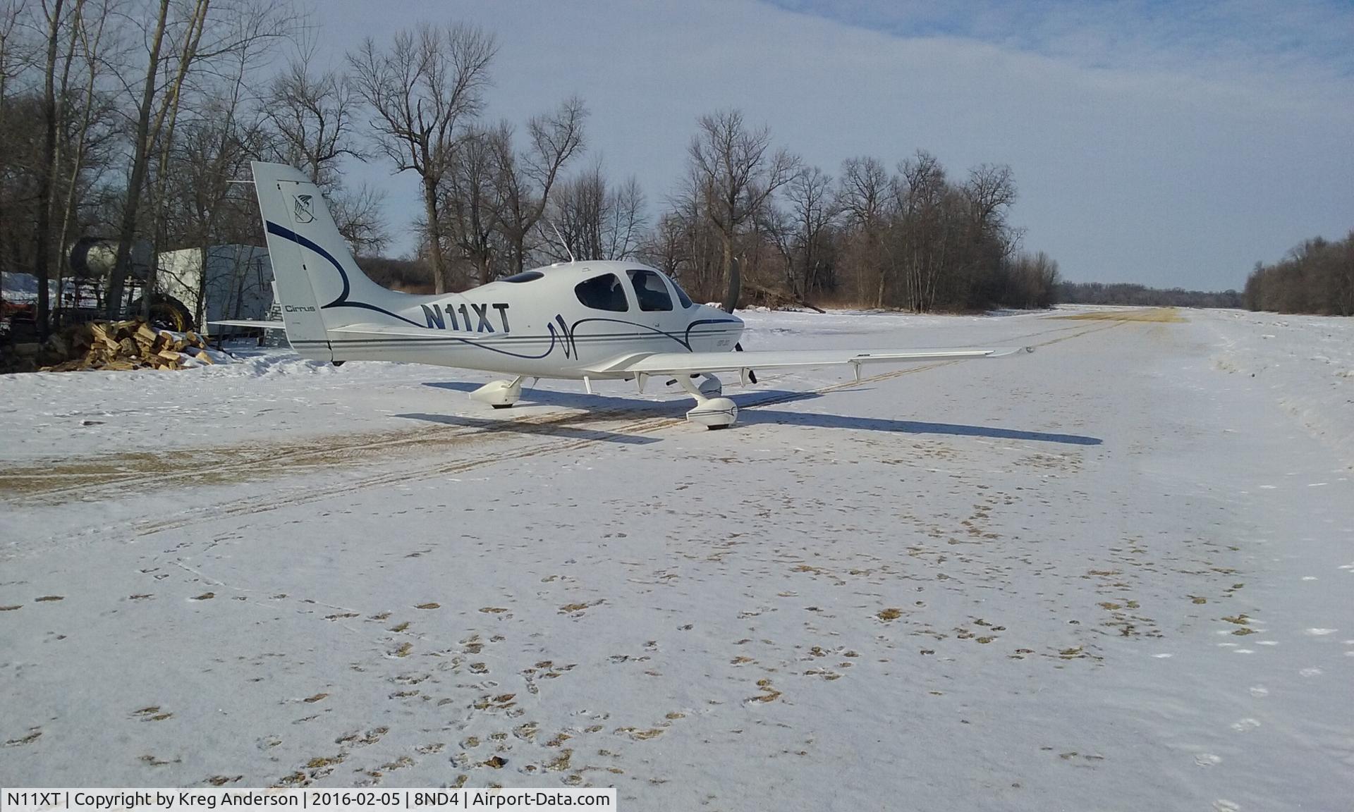 N11XT, 2000 Cirrus SR20 C/N 1103, Cirrus SR20 departing Manvel, ND.