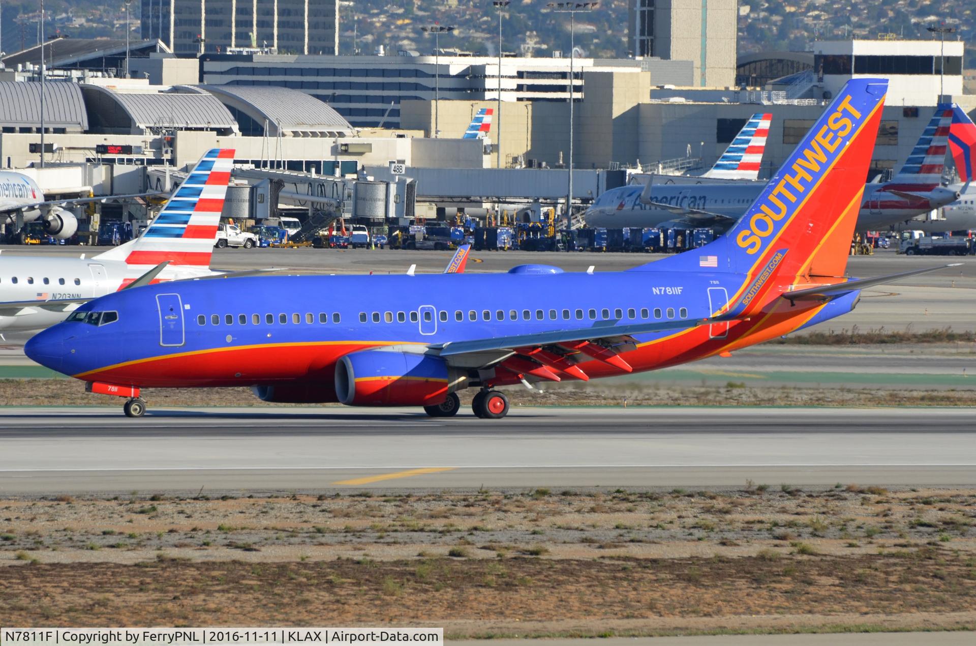 N7811F, 2001 Boeing 737-76N C/N 28654, Southwest B737 vacating the runway.