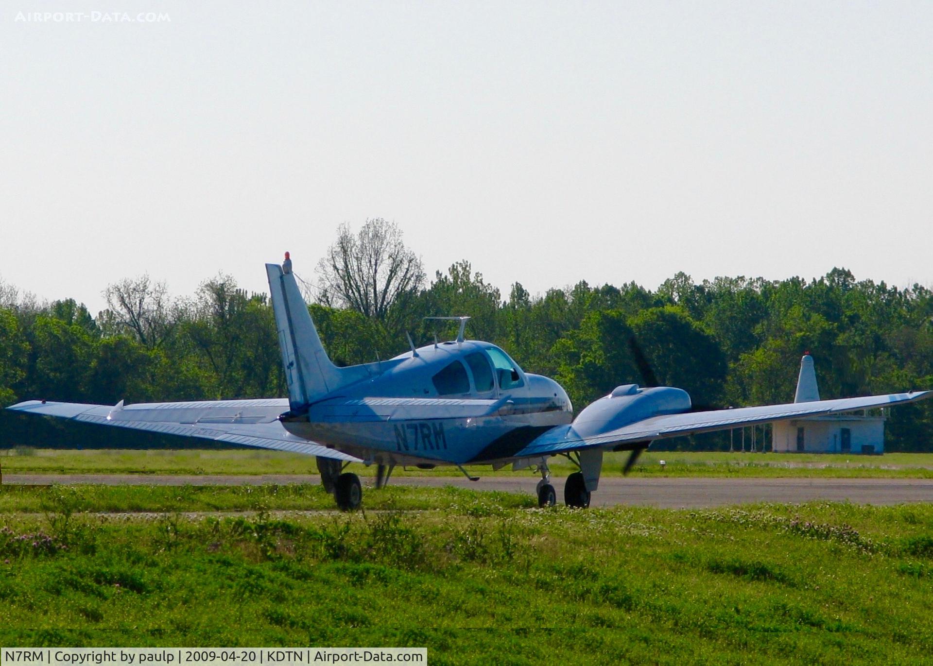 N7RM, 1967 Beech C55 Baron (95-C55) C/N TE-347, Returning to take off after aborting first one because passenger  door was not shut.