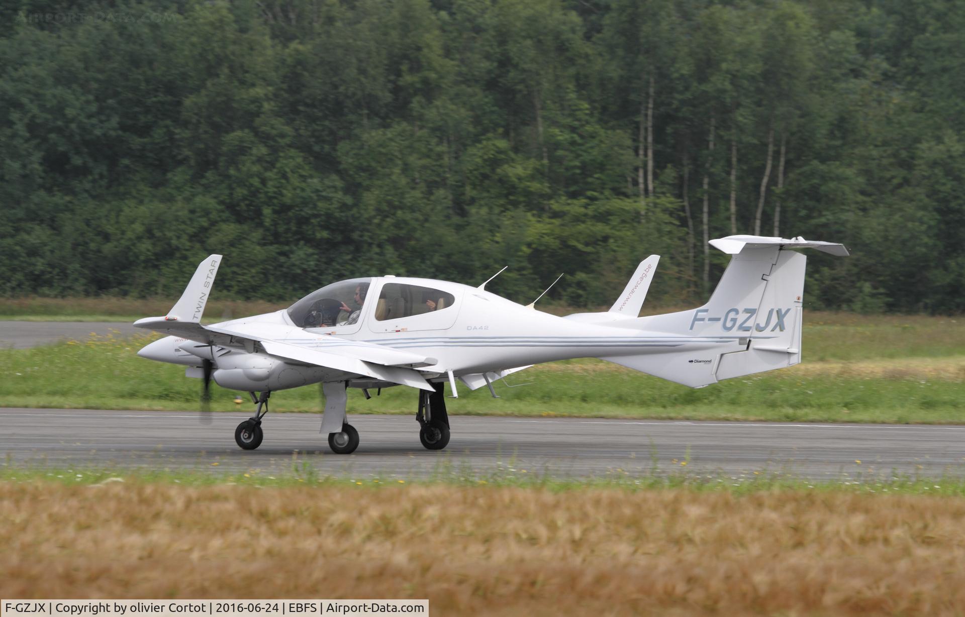 F-GZJX, Diamond DA-42 Twin Star C/N 42.024, landing at Florennes