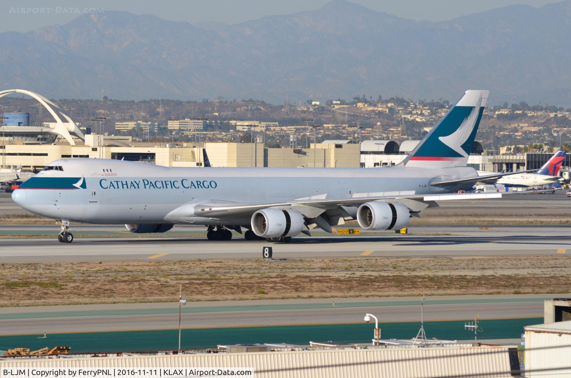 B-LJM, 2013 Boeing 747-867F/SCD C/N 43825, Cathay Pacific B748F coming to a stop