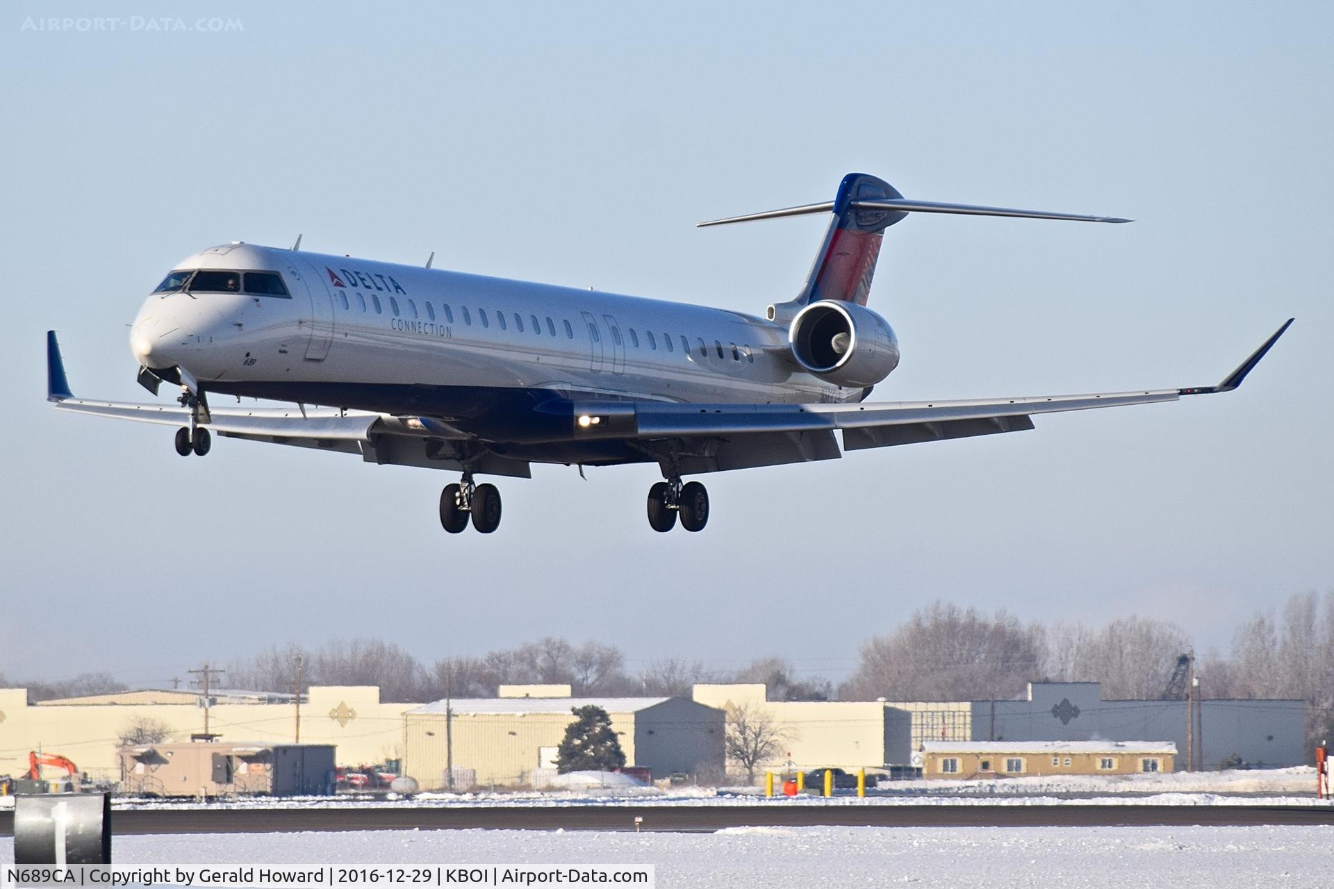 N689CA, 2007 Bombardier CRJ-900ER (CL-600-2D24) C/N 15133, On final for RWY 10L.