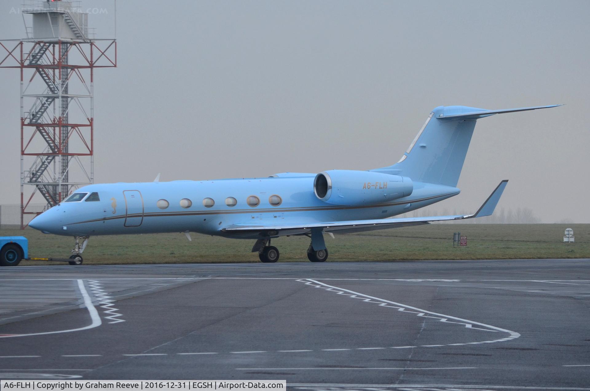 A6-FLH, 2009 Gulfstream Aerospace GIV-X (G450) C/N 4155, Fresh out of spray and under tow on a foggy morning.