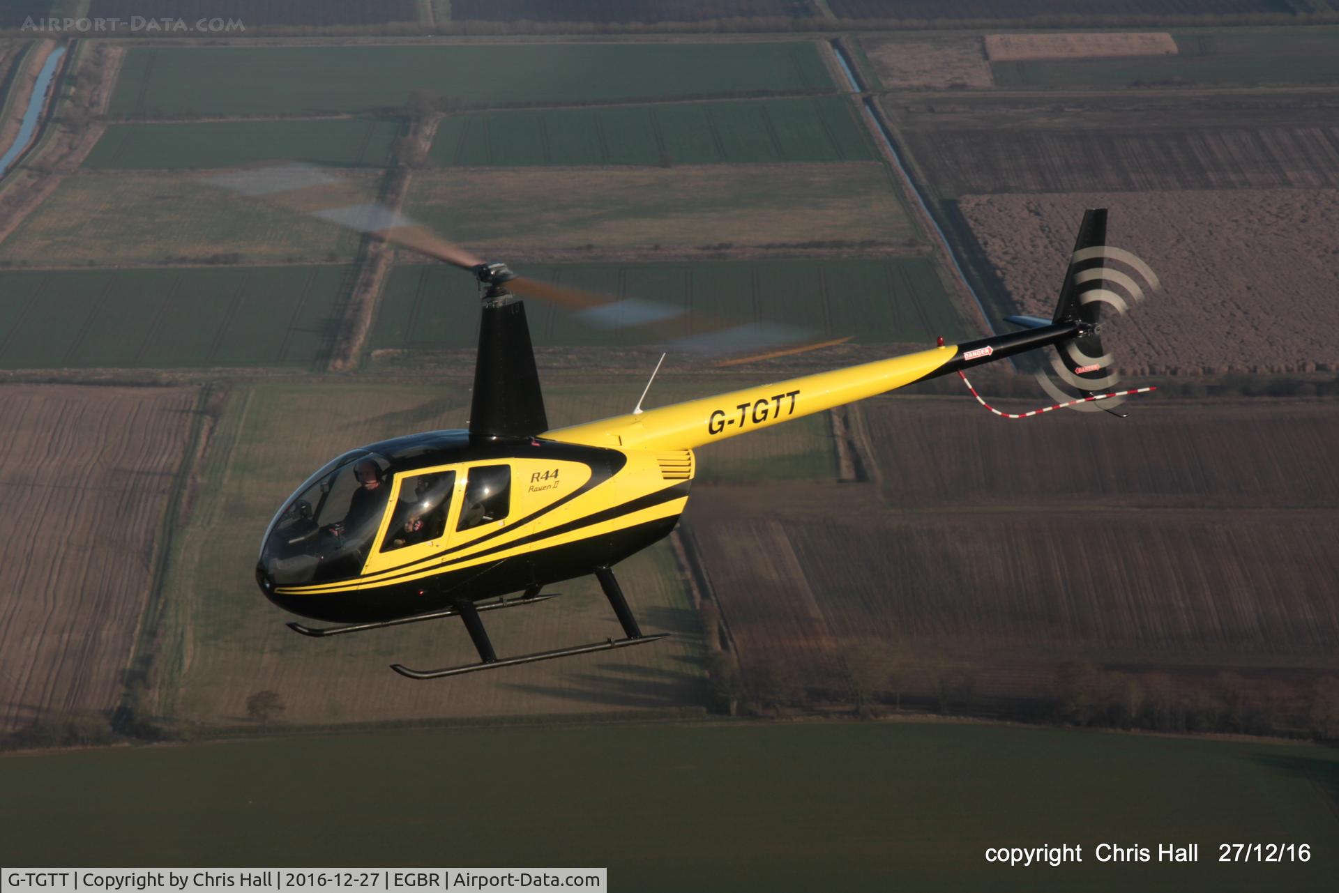 G-TGTT, 2002 Robinson R44 Raven II C/N 10023, air 2 air with Aiden in his R44