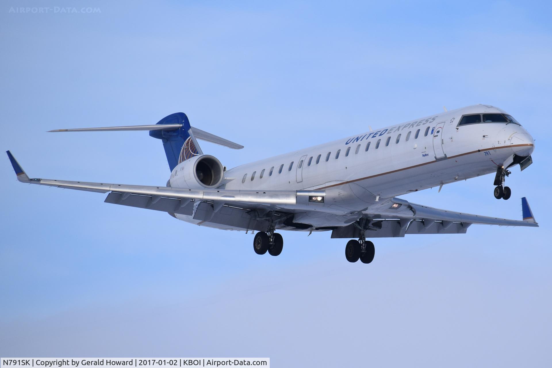 N791SK, 2009 Bombardier CRJ-700 (CL-600-2C10) Regional Jet C/N 10293, Landing RWY 10L.