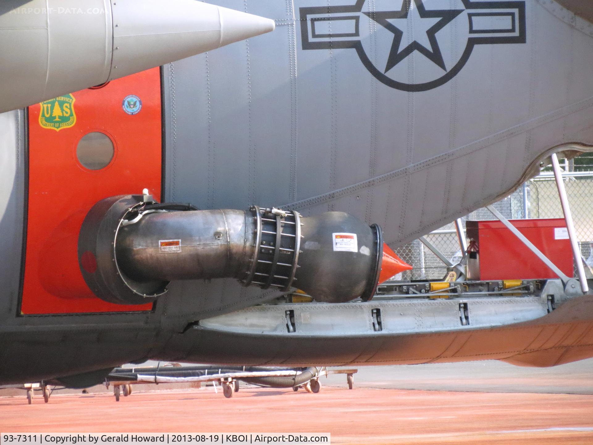 93-7311, 1994 Lockheed C-130H Hercules C/N 382-5374, On NIFC ramp equipped with MAFFS nozzle on port side. Tanker 3 , 153rd Airlift Wing, WY ANG.