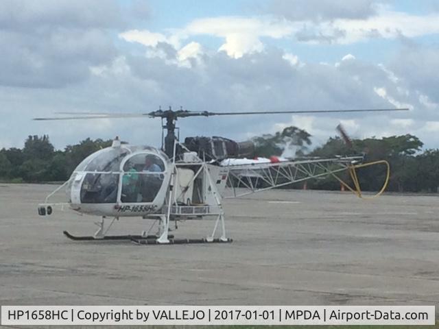 HP1658HC, Aerospatiale SA-315B Lama C/N 2635, Just took my attention while boarding a Air Panama flight in David Panama, this helicopter has the engine completely uncovered with no cowlings whatsoever, so i just starting wondering , what if, FOD or fire containment.