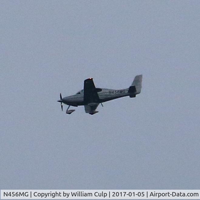 N456MG, Cirrus SR22 C/N 3330, Cloudy day for a photo and a little far out for the conditions. It was flying over Peace Valley Park, Bucks County Pa.