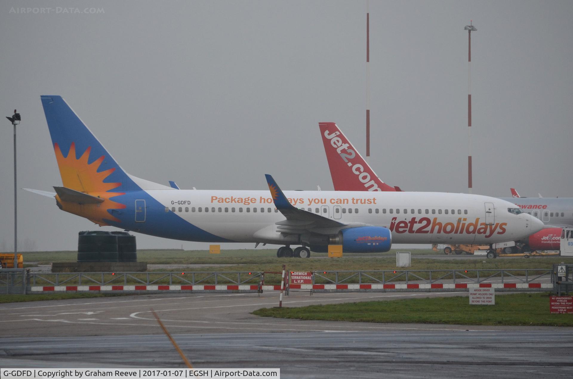 G-GDFD, 1997 Boeing 737-8K5 C/N 27982, Under tow at Norwich.
