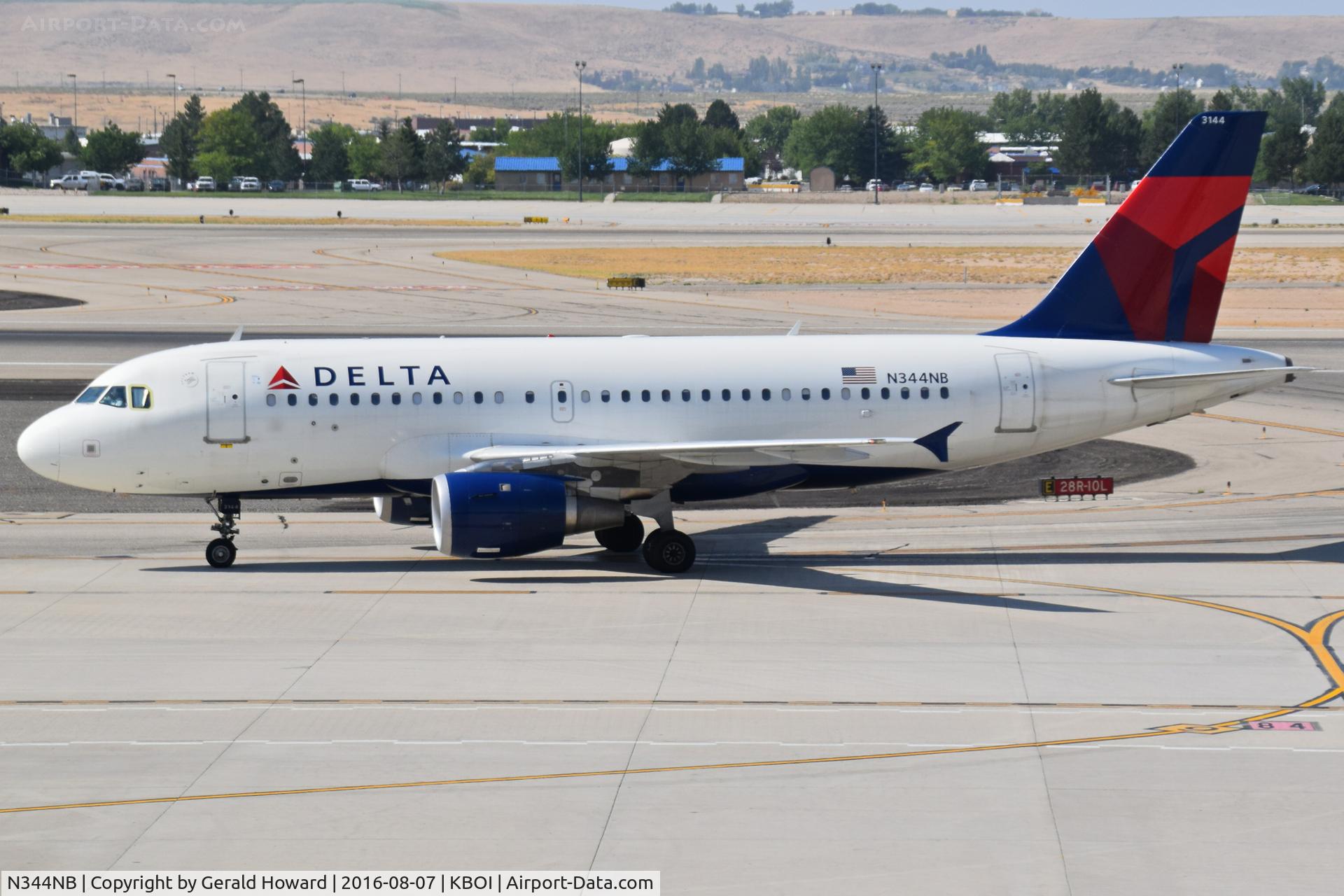 N344NB, 2002 Airbus A319-114 C/N 1766, On Alpha headed to the gate.