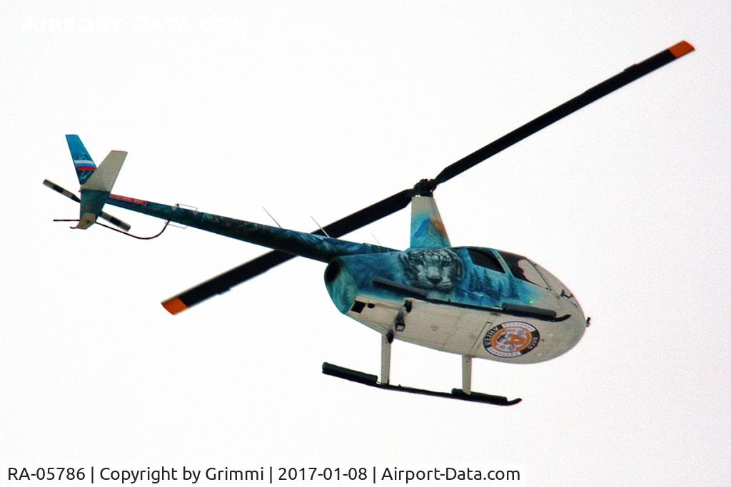 RA-05786, Robinson R66 C/N 0534, Just passed above me in very poor weather, minimum altitude in formation with R66 RA-06393. 