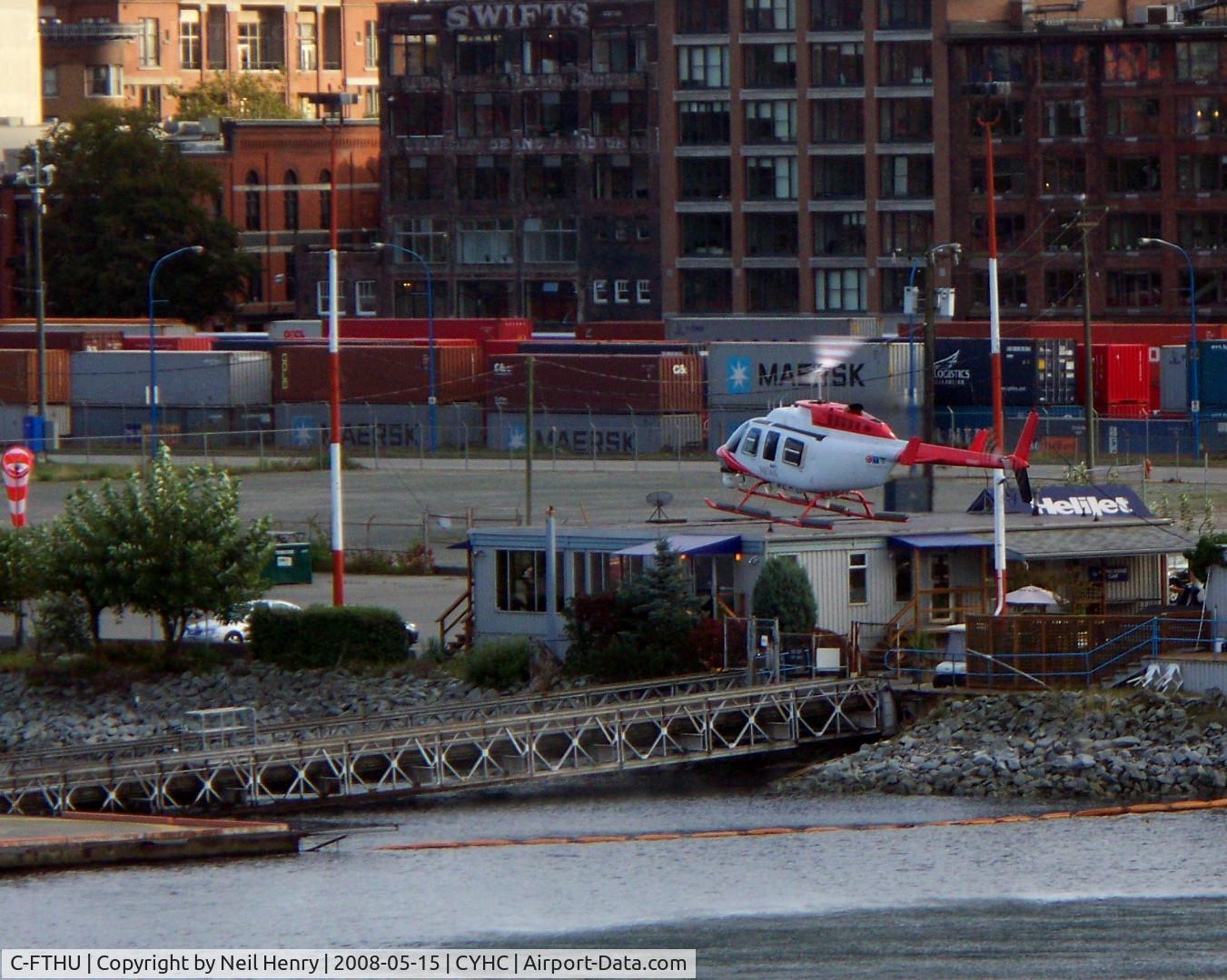 C-FTHU, 1996 Bell 206L-4 LongRanger IV LongRanger C/N 52176, taken as landing at heliport in Vancouver harbour, adjacent to container terminal - Sept 2008