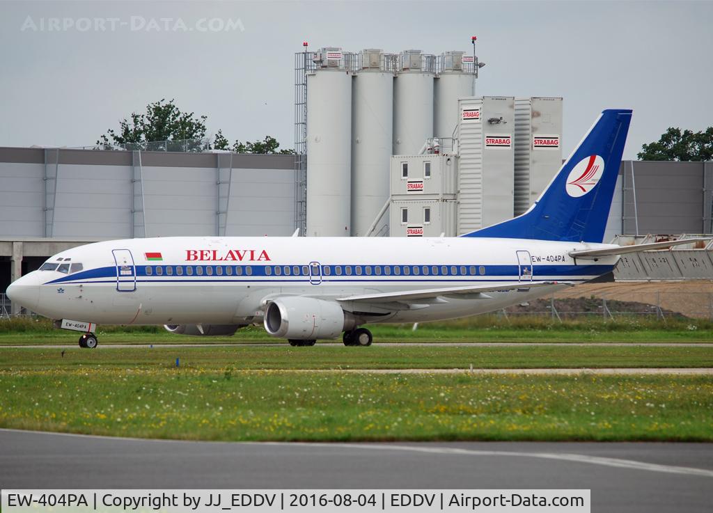 EW-404PA, 1992 Boeing 737-3L9 C/N 27061, Welcome to Hannover,in the background the big construction site for the new apron.