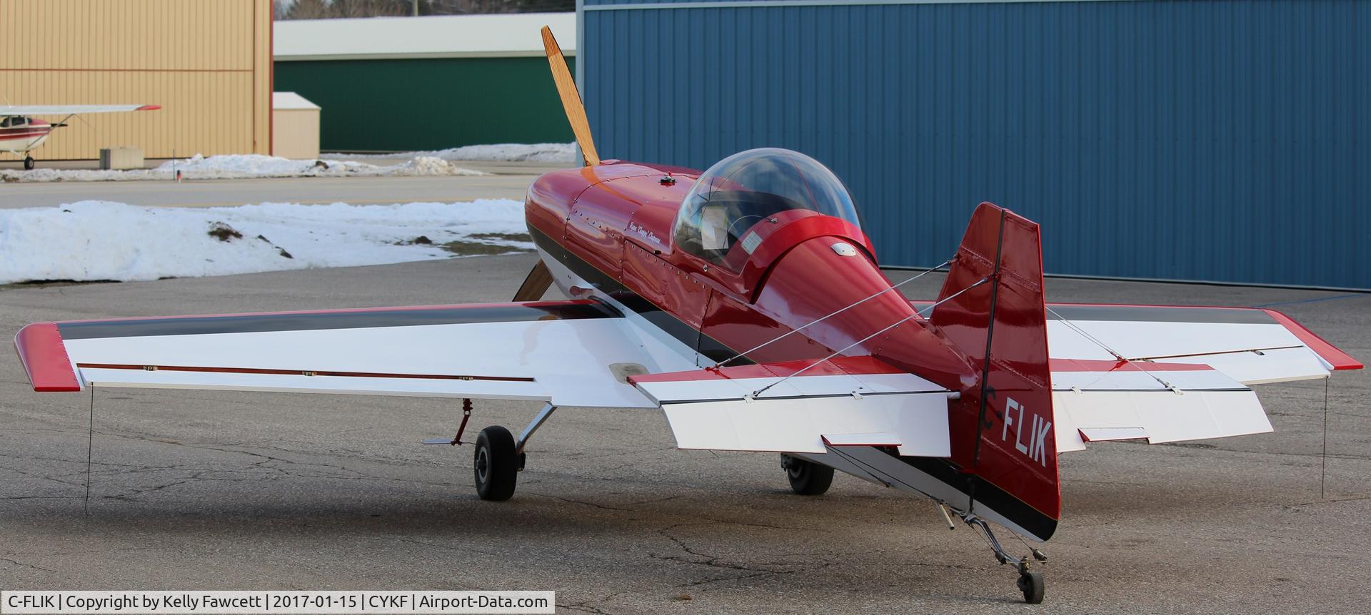 C-FLIK, 1998 Rihn DR-107 One Design C/N 94 - 0017, Getting out for a flight in the box.