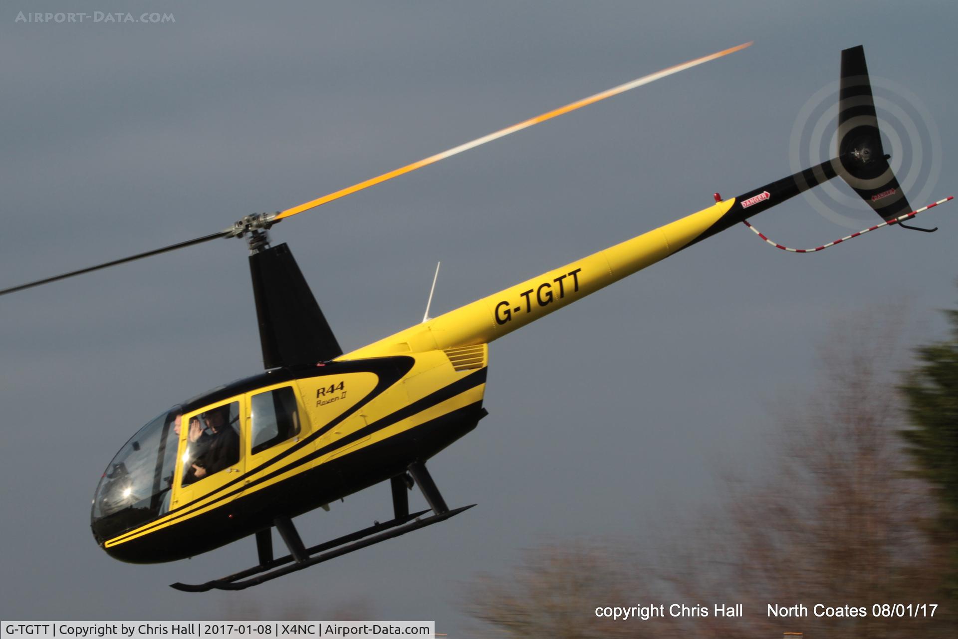 G-TGTT, 2002 Robinson R44 Raven II C/N 10023, at the Brass Monkey fly in, North Coates