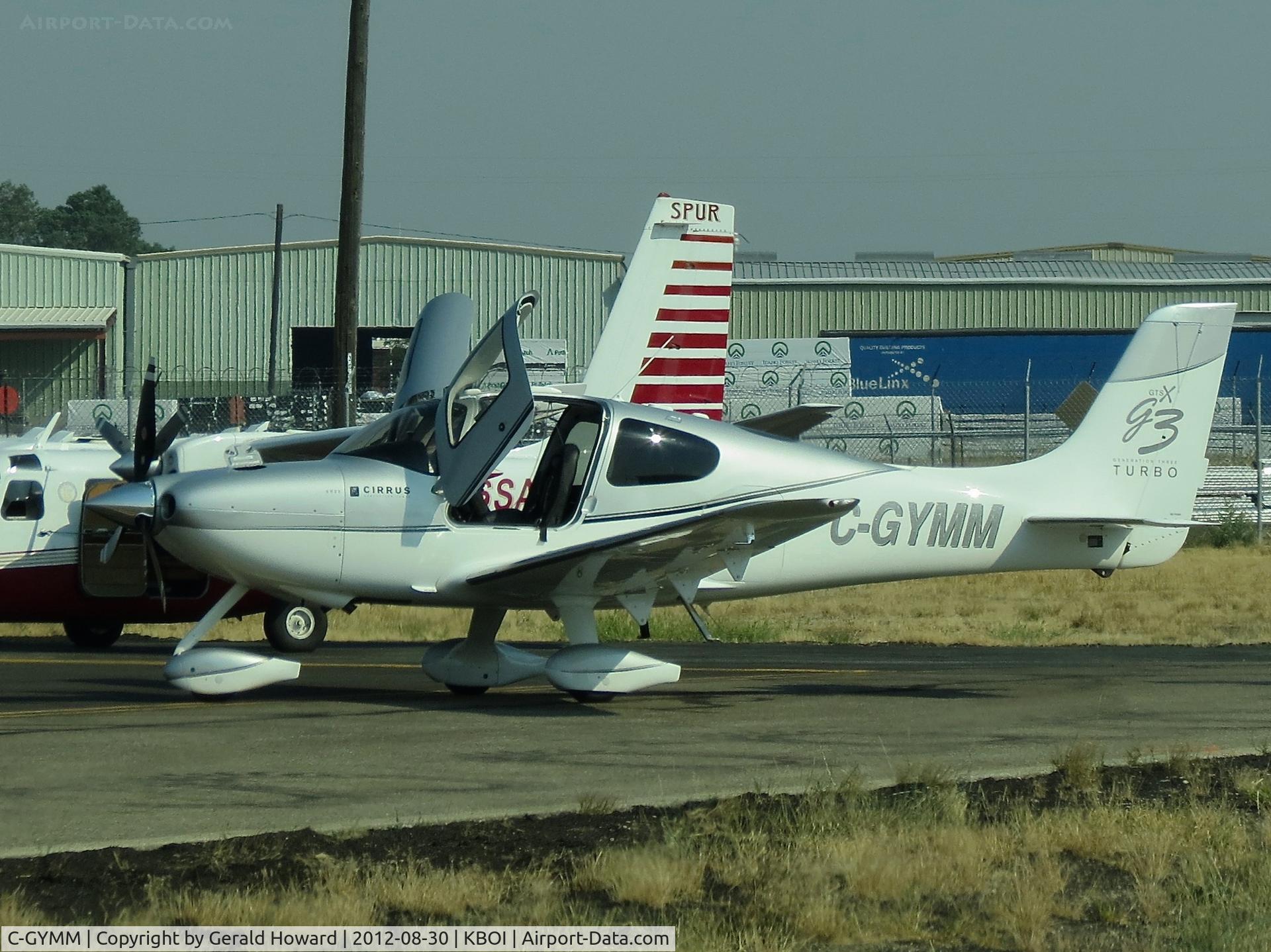 C-GYMM, 2007 Cirrus SR-22 G3 GTS Turbo C/N 2451, Refueling on U. S. Customs ramp.