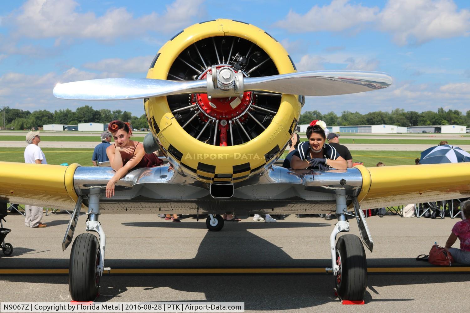 N9067Z, 1949 North American T-6G Texan C/N 168-105, T-6G with a couple of pin up girls