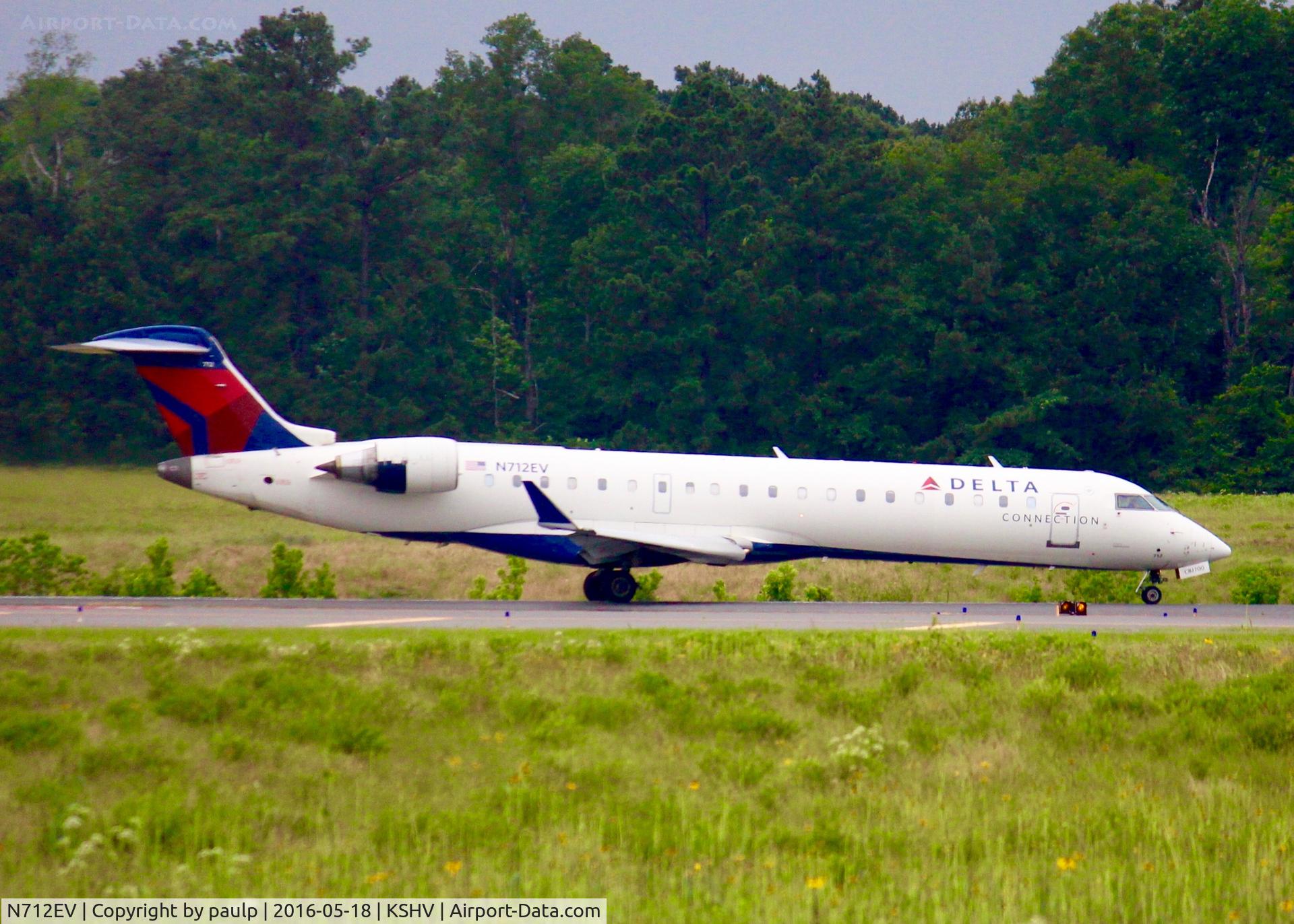 N712EV, 2002 Bombardier CRJ-701ER (CL-600-2C10) Regional Jet C/N 10074, At Shreveport Regional.