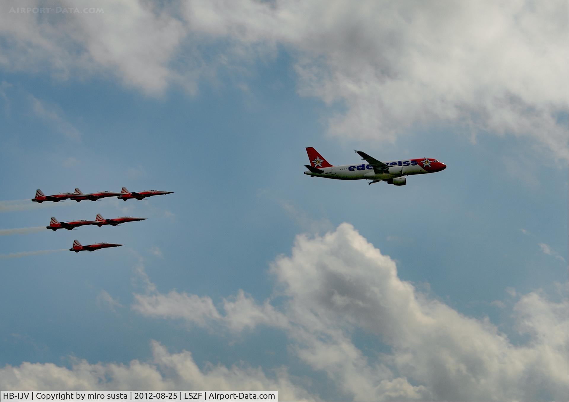 HB-IJV, 2003 Airbus A320-214 C/N 2024, Edelweiss Airlines Airbus A320 airplane in company of Swiss Air Force Northrop F-5E Tiger II Airplanes during air-show at Birrfeld airfield in Switzerland