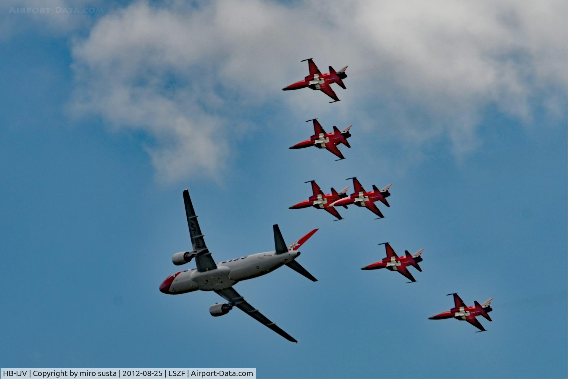 HB-IJV, 2003 Airbus A320-214 C/N 2024, Edelweiss Airlines Airbus A320 airplane in company of Swiss Air Force Northrop F-5E Tiger II Airplanes during air-show at Birrfeld airfield in Switzerland