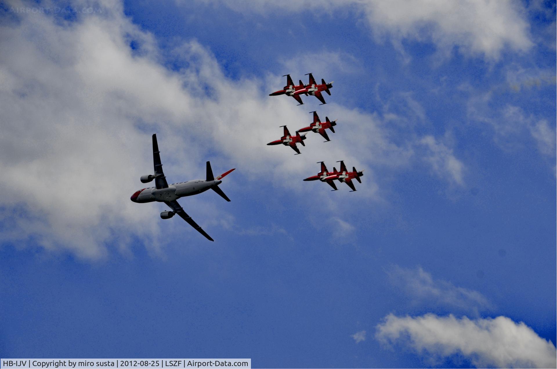 HB-IJV, 2003 Airbus A320-214 C/N 2024, Edelweiss Airlines Airbus A320 airplane in company of Swiss Air Force Northrop F-5E Tiger II Airplanes during air-show at Birrfeld airfield in Switzerland