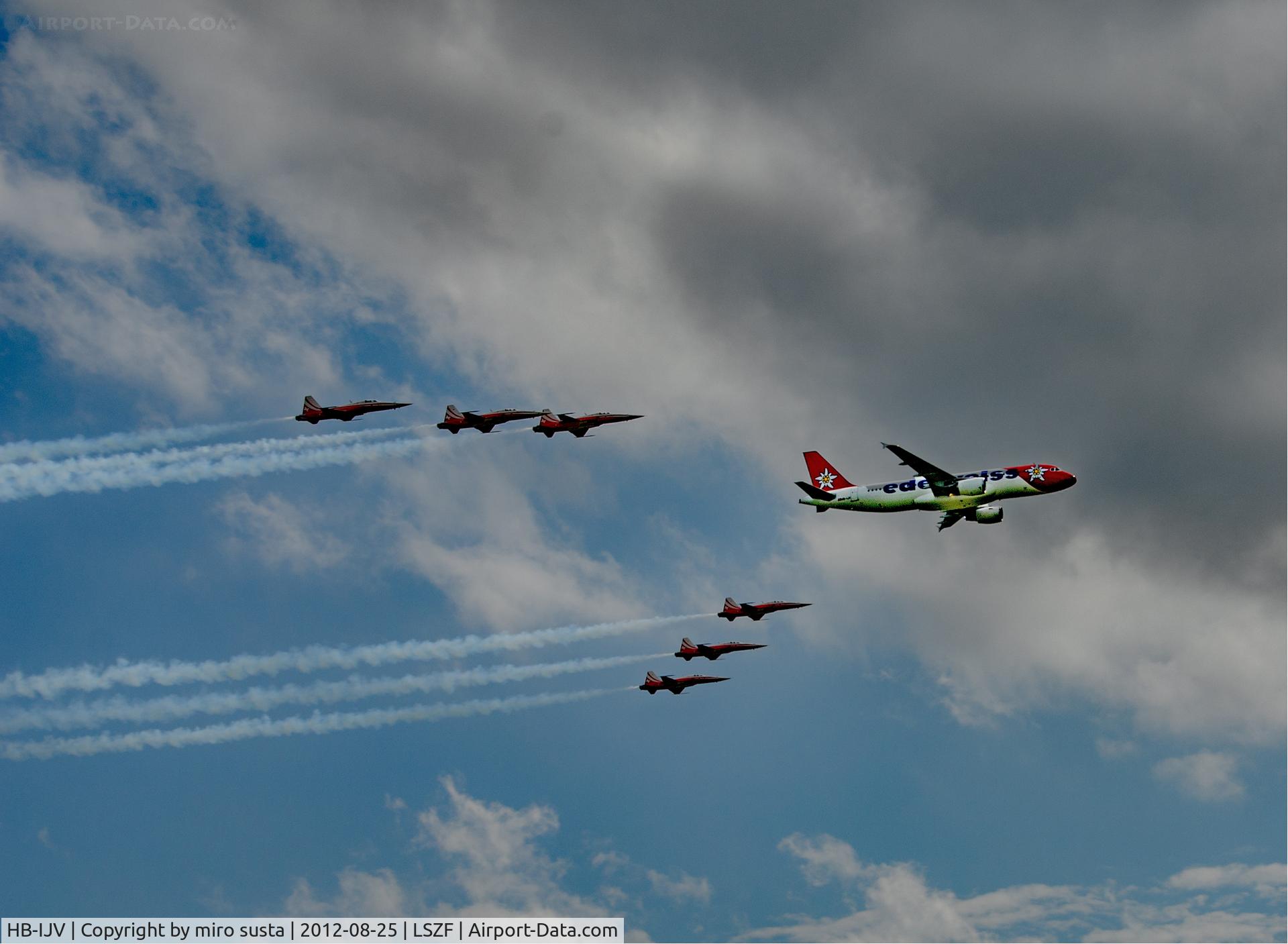 HB-IJV, 2003 Airbus A320-214 C/N 2024, Edelweiss Airlines Airbus A320 airplane in company of Swiss Air Force Northrop F-5E Tiger II Airplanes during air-show at Birrfeld airfield in Switzerland