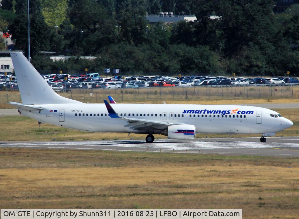 OM-GTE, 2000 Boeing 737-8AS C/N 29925, Lining up rwy 14L with additional Smartwings titles... Sorry for the bad quality :|