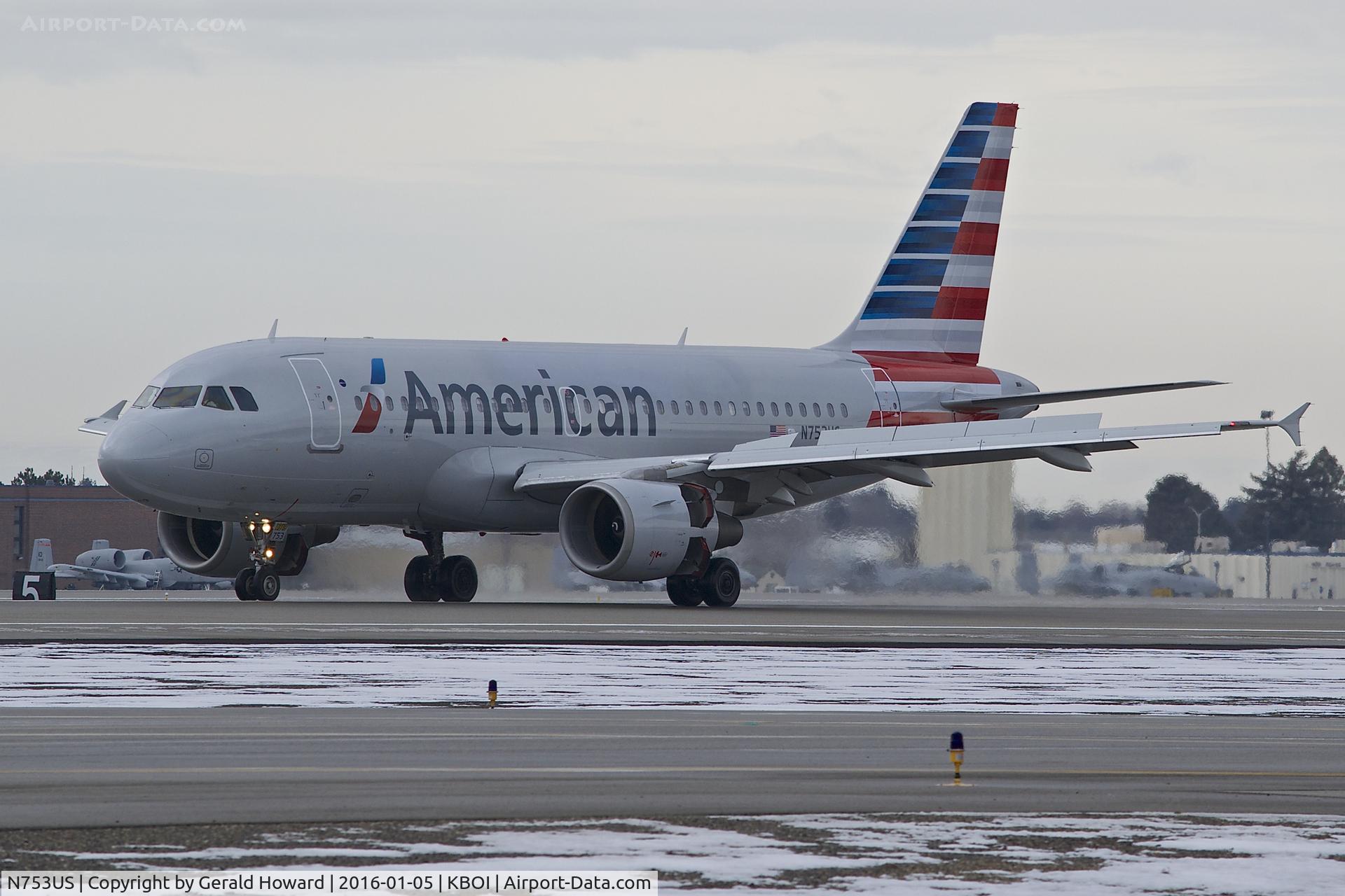 N753US, 2000 Airbus A319-112 C/N 1326, Landing RWY 10L. Reverse thrusters in operation.