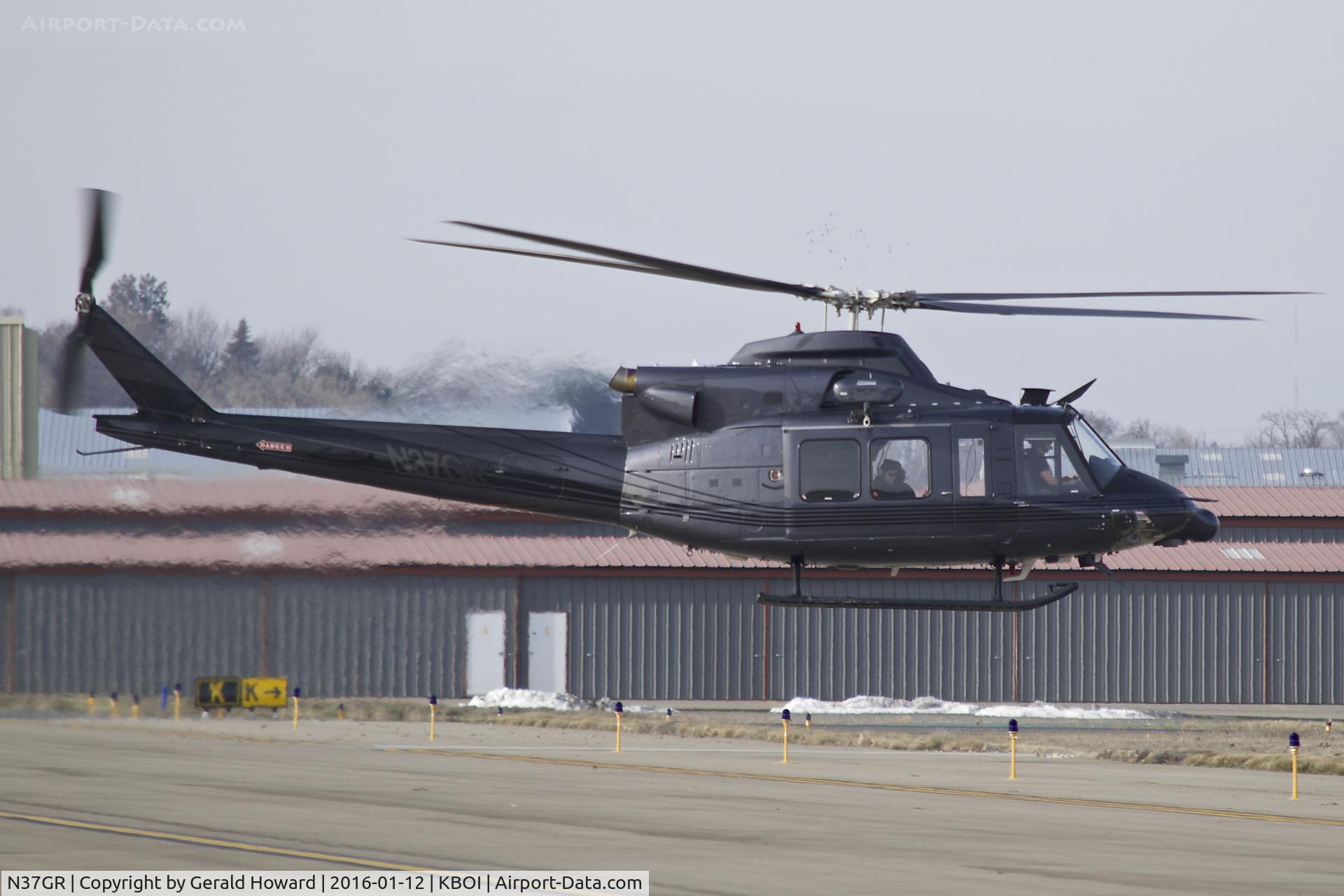 N37GR, 1998 Bell 412 C/N 36209, Departing west bound from BOI.