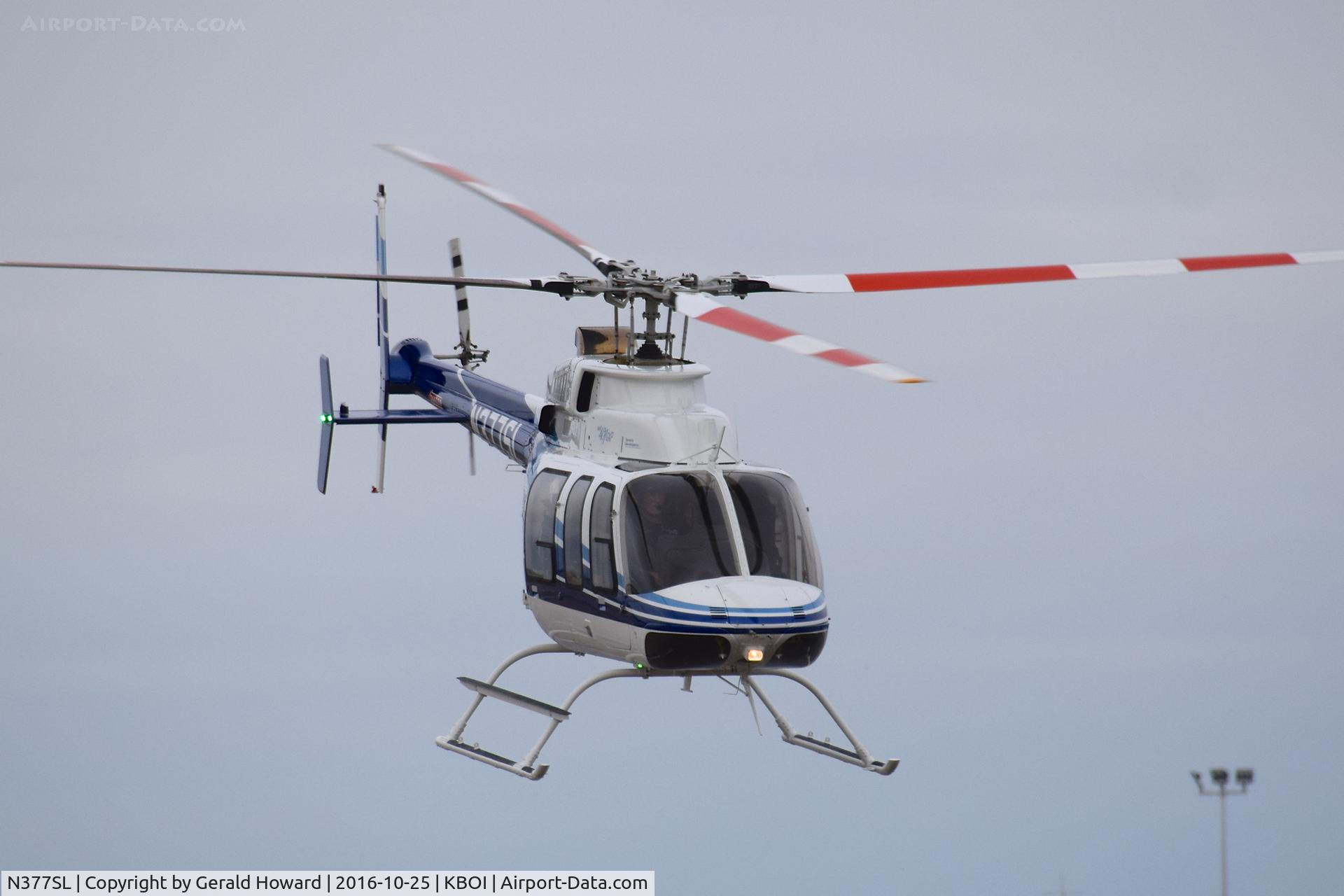 N377SL, 2015 Bell 407GTX C/N 54592, Departing BOI.