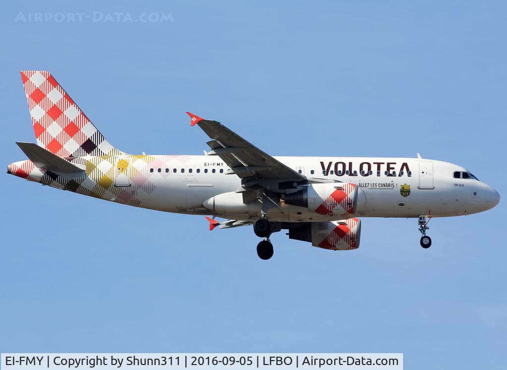 EI-FMY, 2004 Airbus A319-111 C/N 2253, Landing rwy 32L with additional 'Allez les Canaris' titles and patch