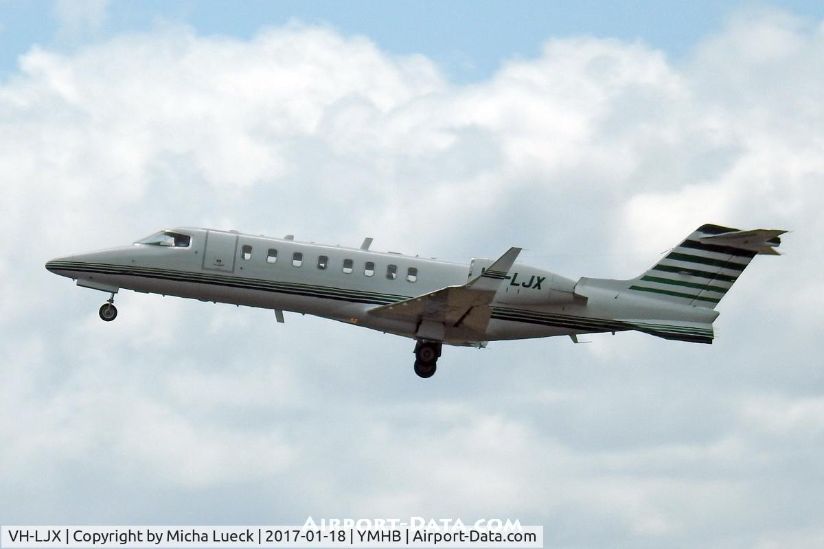 VH-LJX, 1999 Learjet 45 C/N 45-056, At Hobart