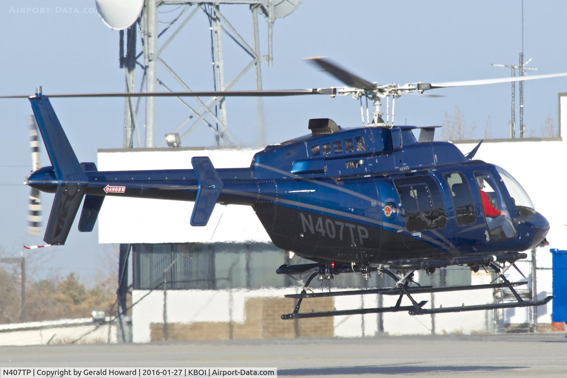N407TP, 2005 Bell 407 C/N 53654, Flare for landing.