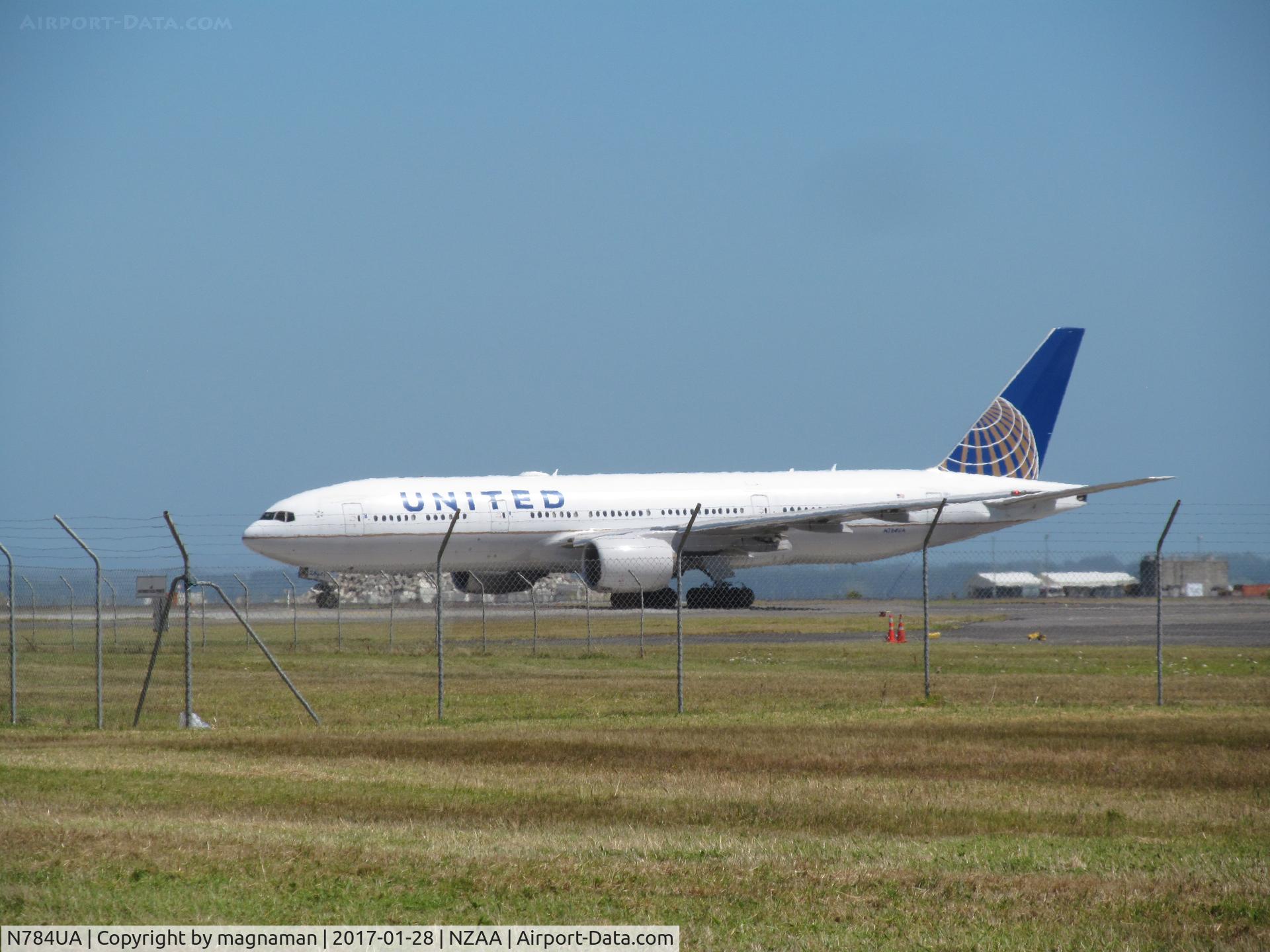 N784UA, 1997 Boeing 777-222/ER C/N 26951, long shot across NZ maintenance apron