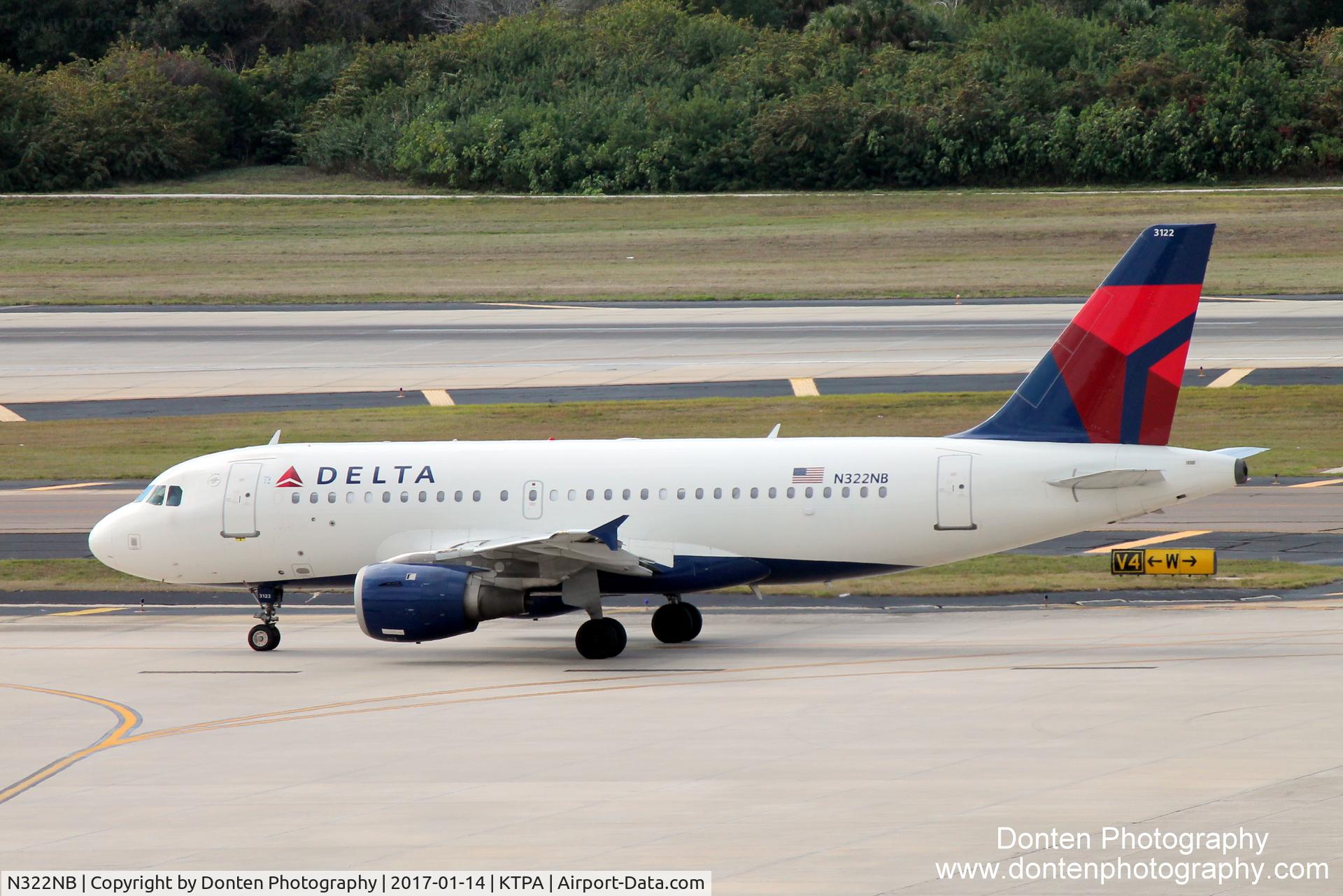 N322NB, 2001 Airbus A319-114 C/N 1434, Delta Flight 1373 (N322NB) taxis at Tampa International Airport prior to flight to Hartsfield-Jackson Atlanta International Airport