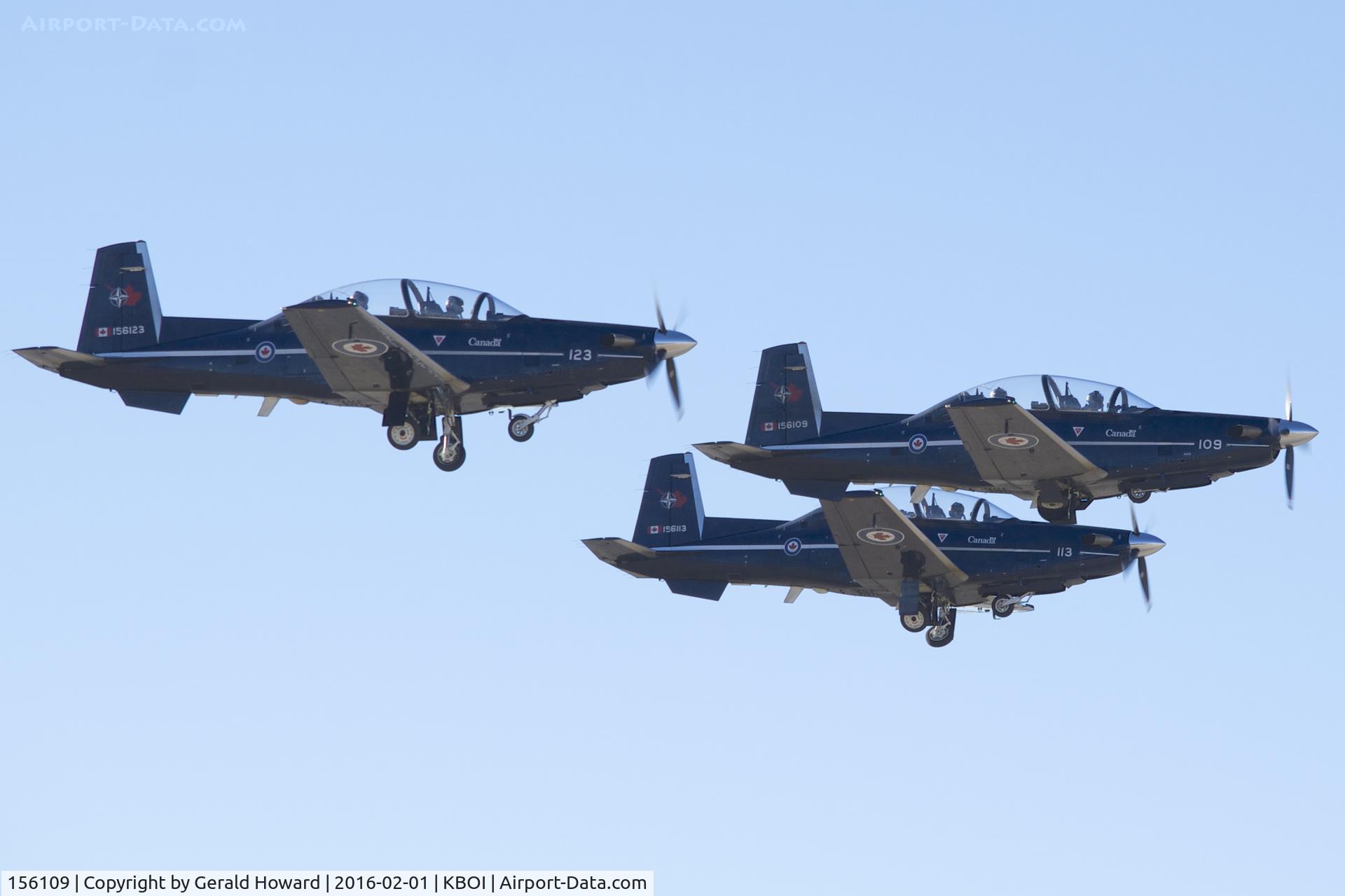 156109, Raytheon CT-156 Harvard II C/N PF-9, Departing BOI leading 156123 & 156113.  No.2 CFFTS, Moose Jaw, Saskatchewan, Canada