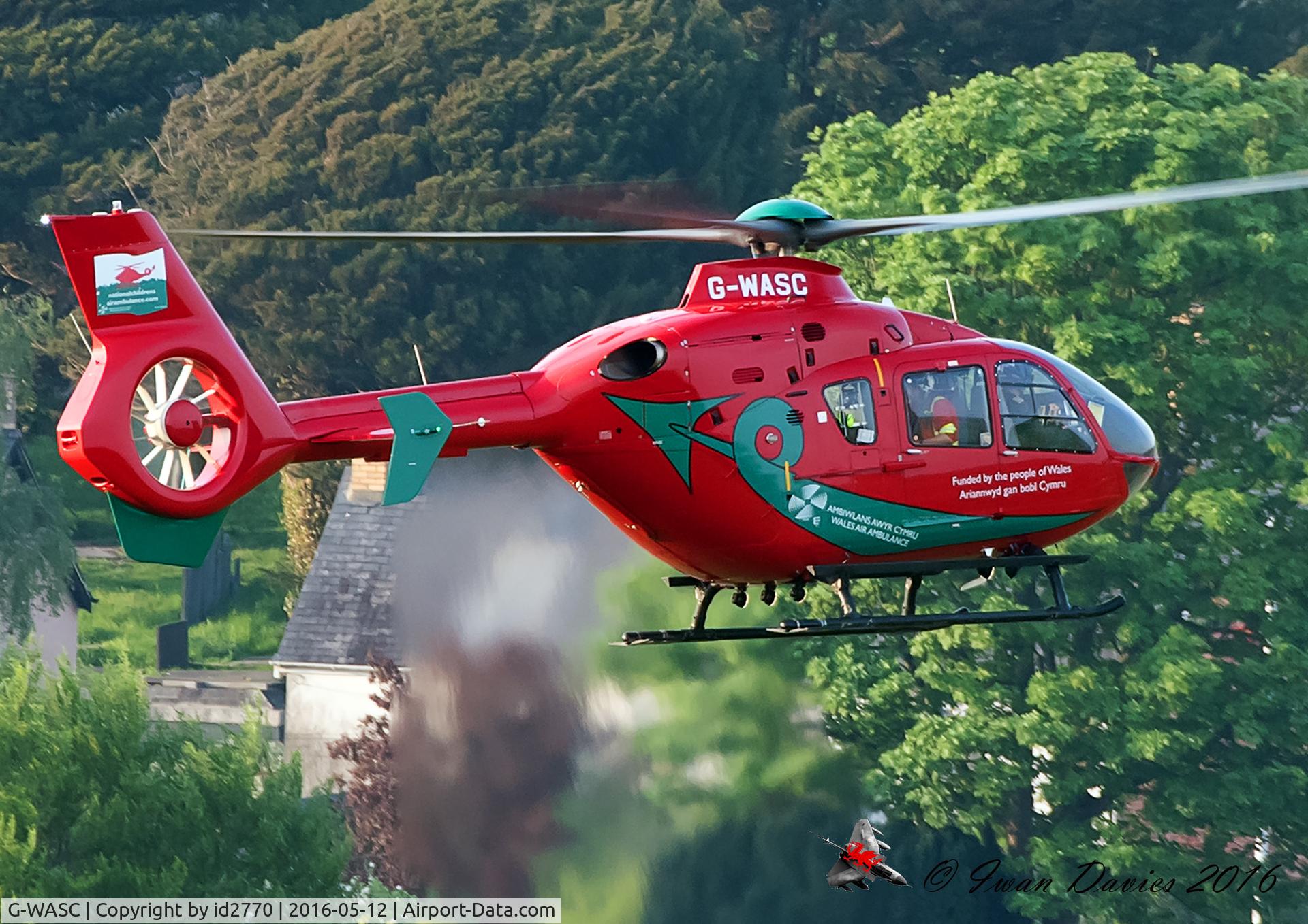 G-WASC, 2012 Eurocopter EC-135T-2+ C/N 1074, Departing from Aberystwyth, after casualty drop off.