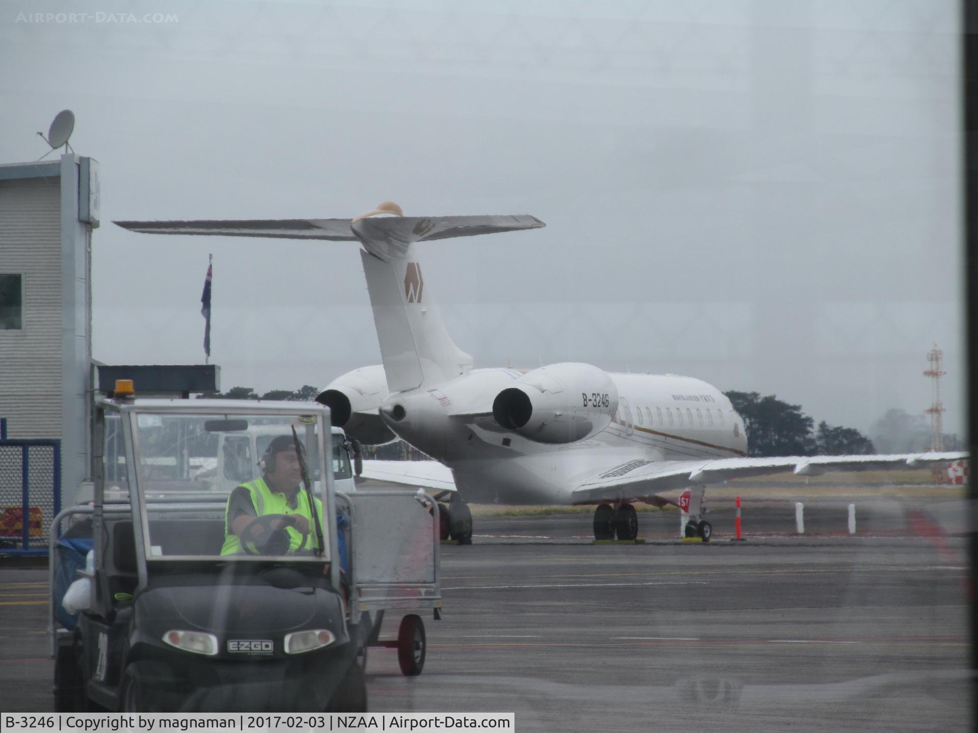 B-3246, 2015 Bombardier BD-700-1A10 Global 6000 C/N 9712, across apron through fence and two glass windows!!!
