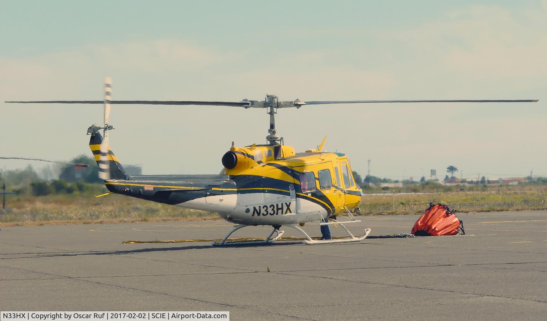 N33HX, 1976 Bell 205A-1 C/N 30235, N33HX returning to Carriel Sur (Concepción, Chile) airport after a firefighting sortie.